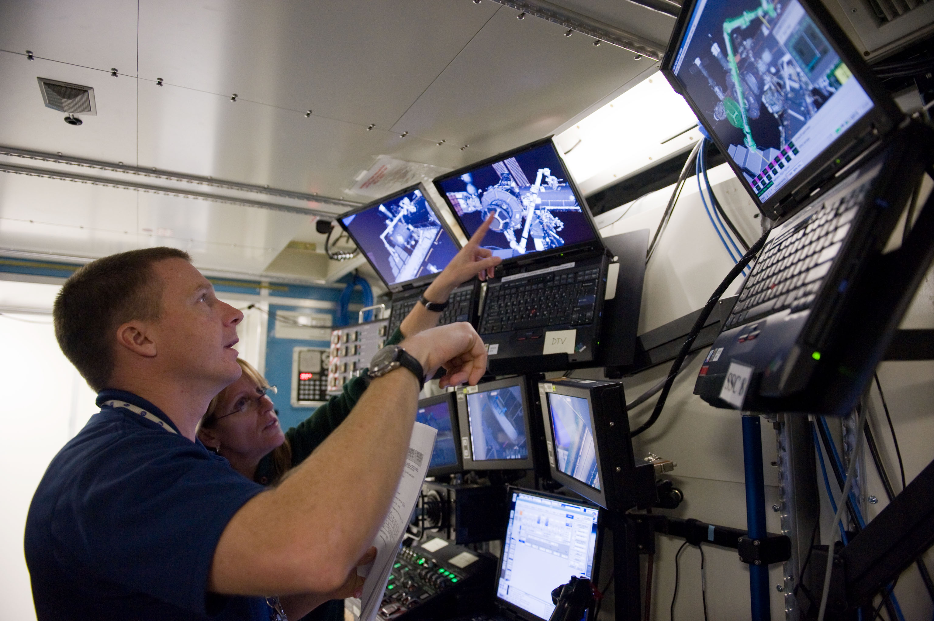STS-130 crew members Kay Hire and Terry Virts training in the ISS Lab