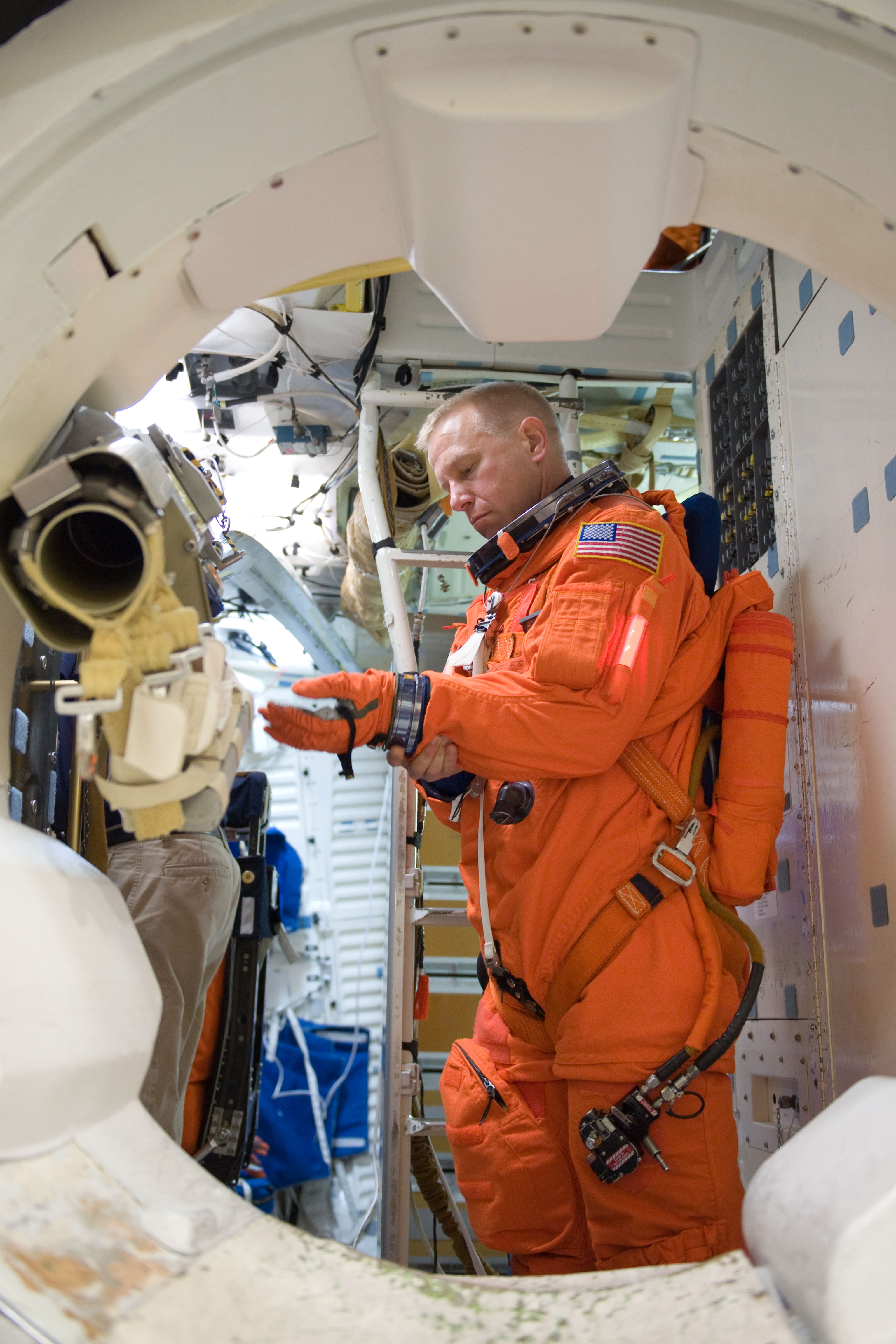 STS-133 crew during Payload Egress training in Full Fuselage Trainer (FFT)