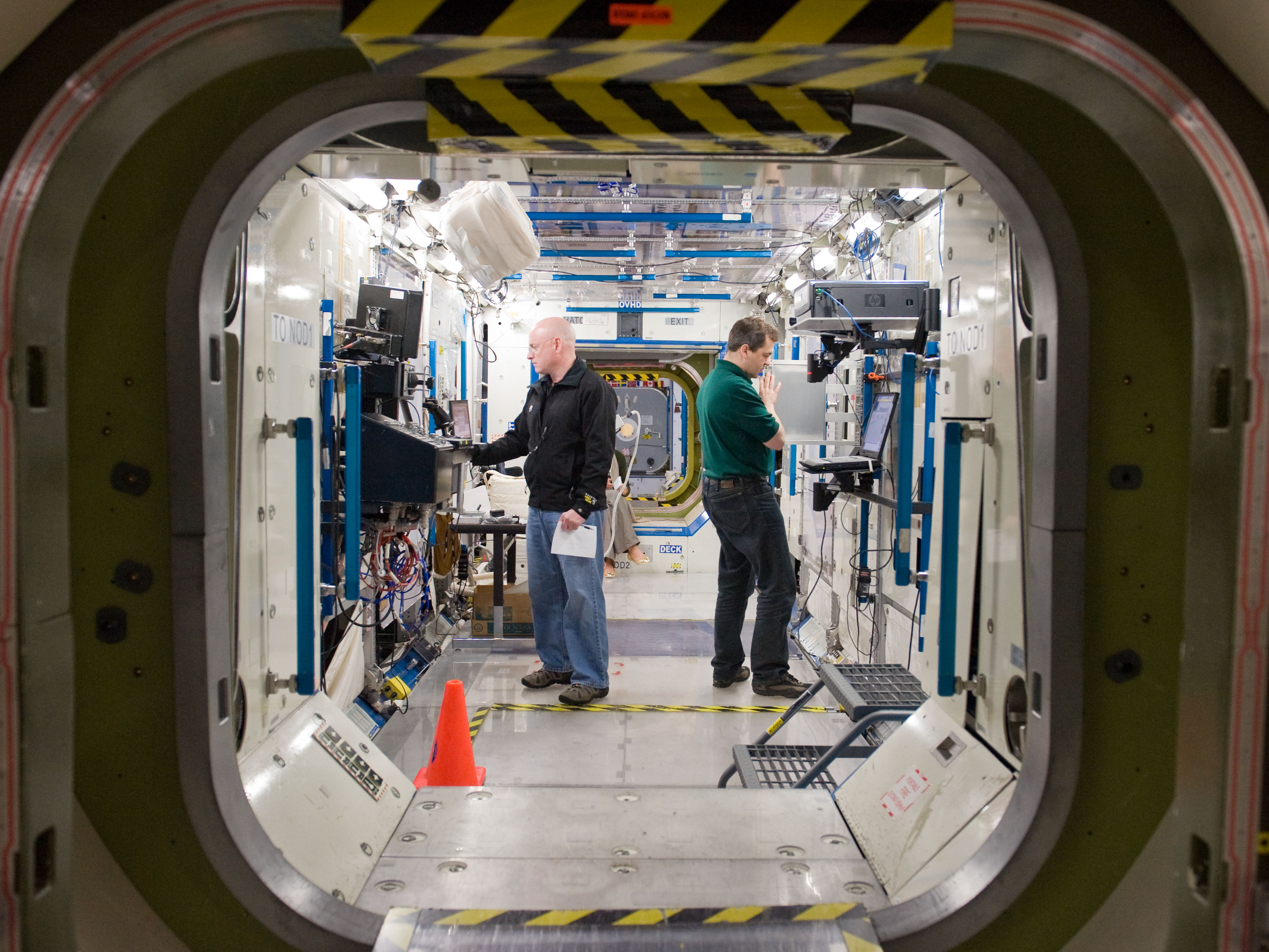 Expedition 25 crew members, Kaleri, Skripochka and S. Kelly during routine ops training.