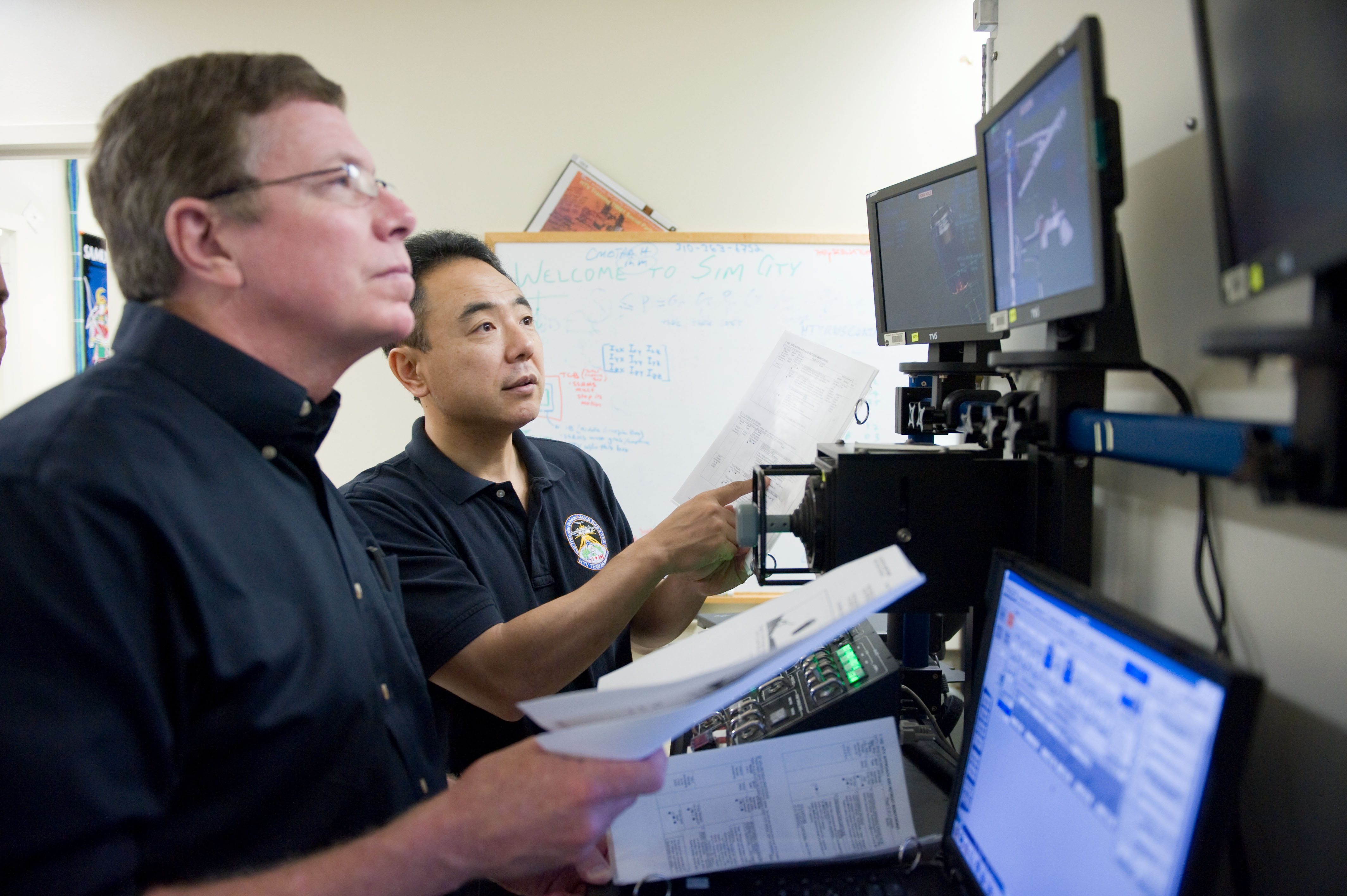 Expedition 28 JAXA astronaut Satoshi Furukawa and Astronaut Mike Fossum