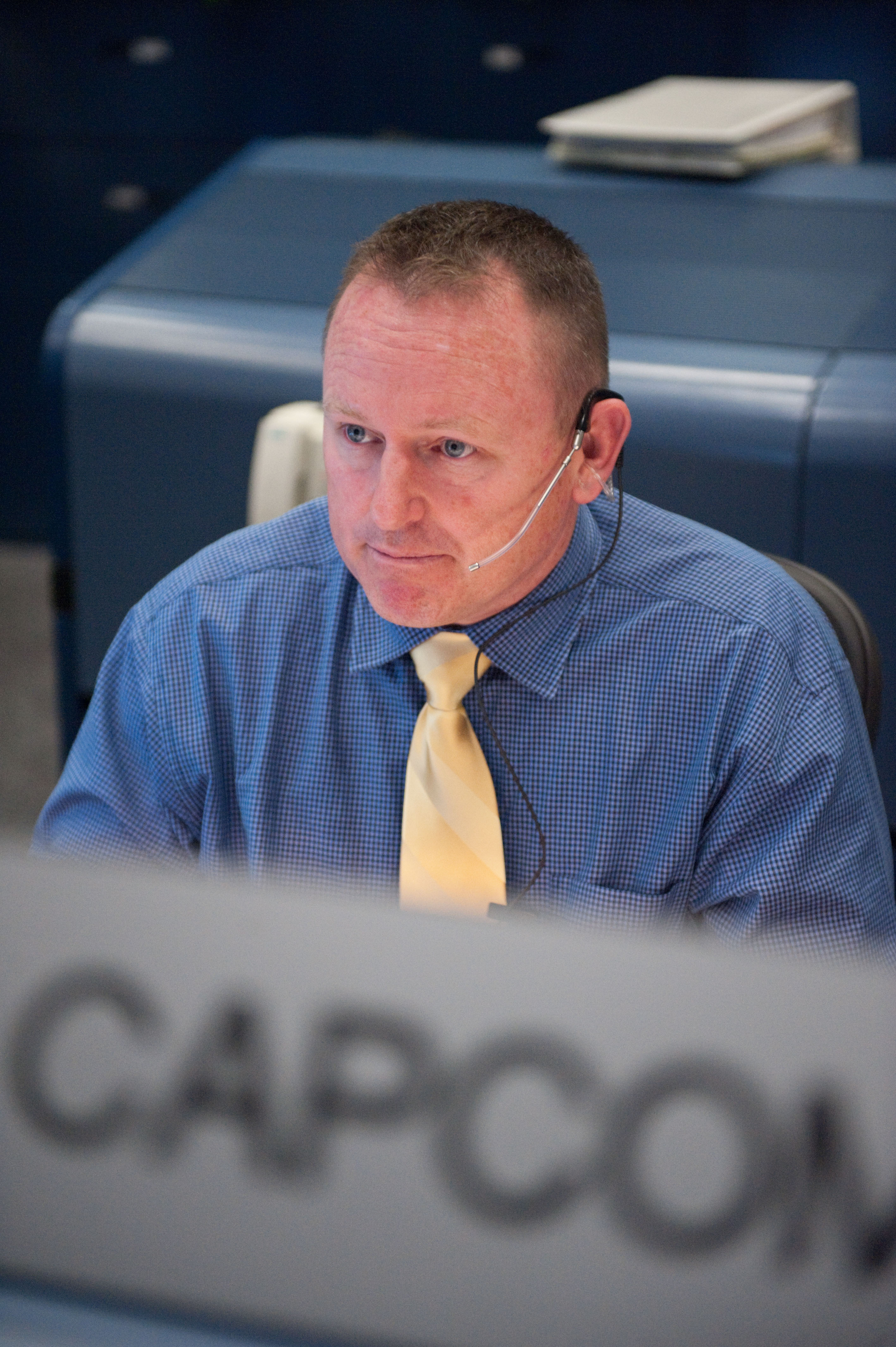 STS-133 flight controllers on console during the launch of Discovery