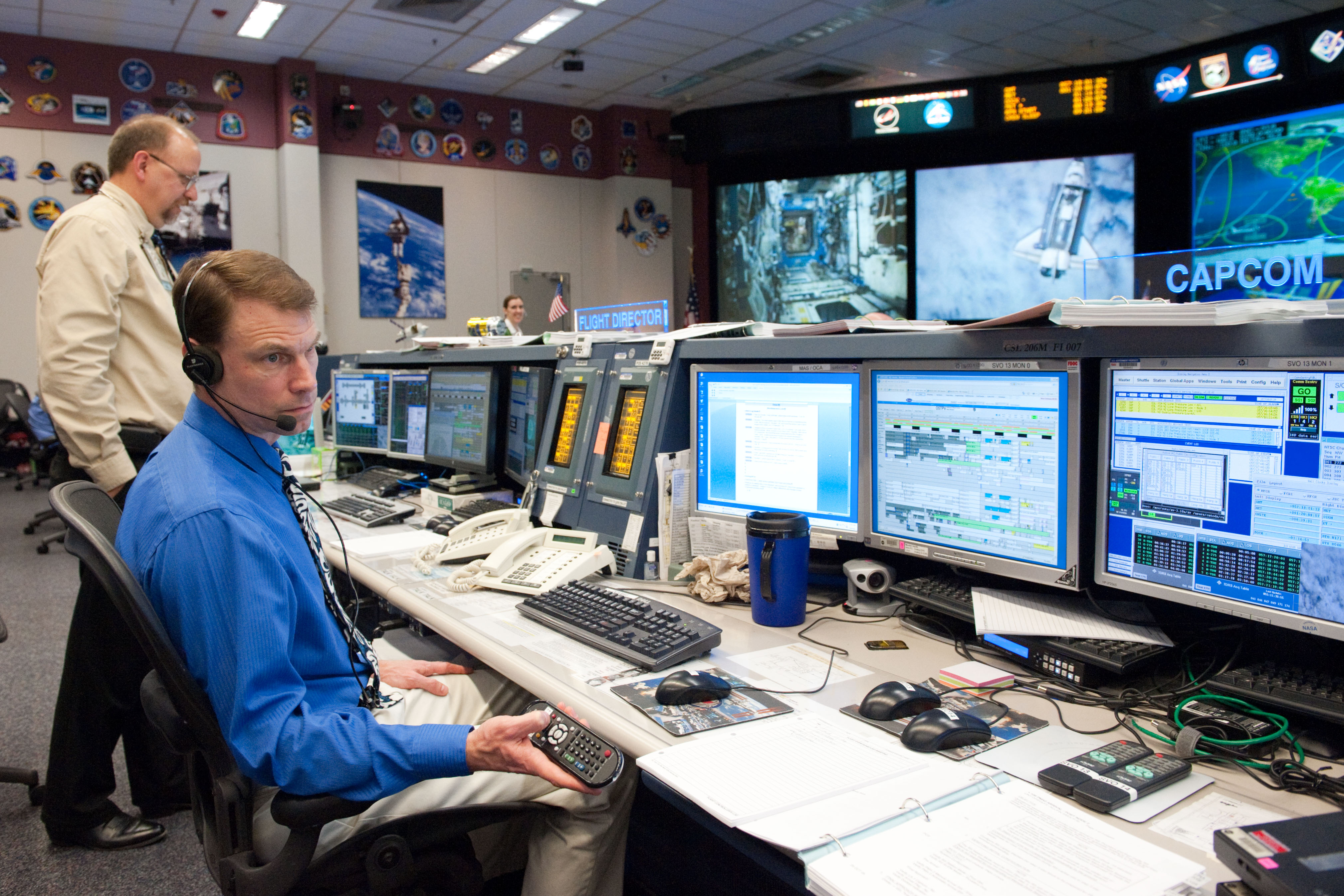 STS133/ULF5 Flight Controllers on Console - Orbit 1