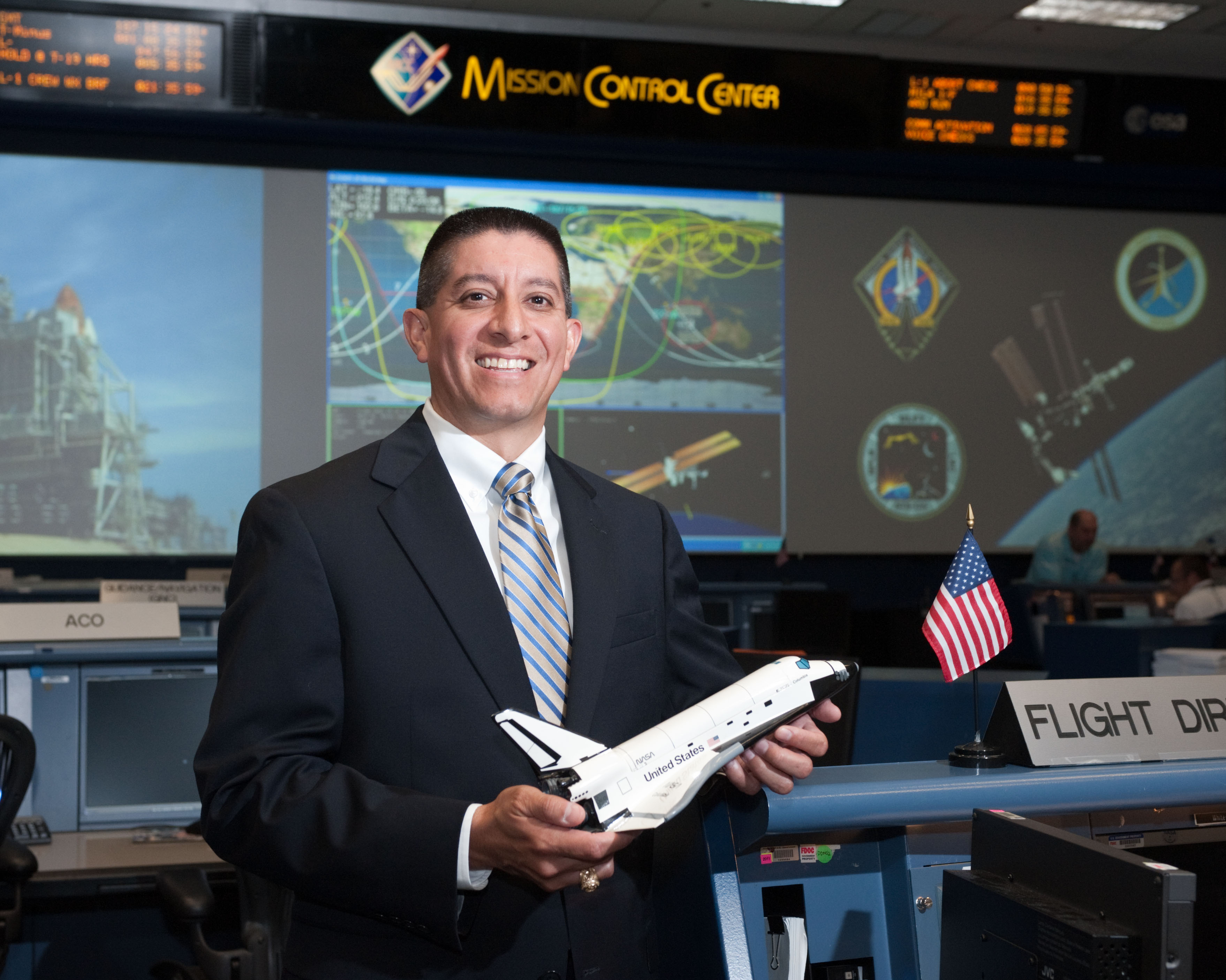 STS-135 Flight Controllers on Console