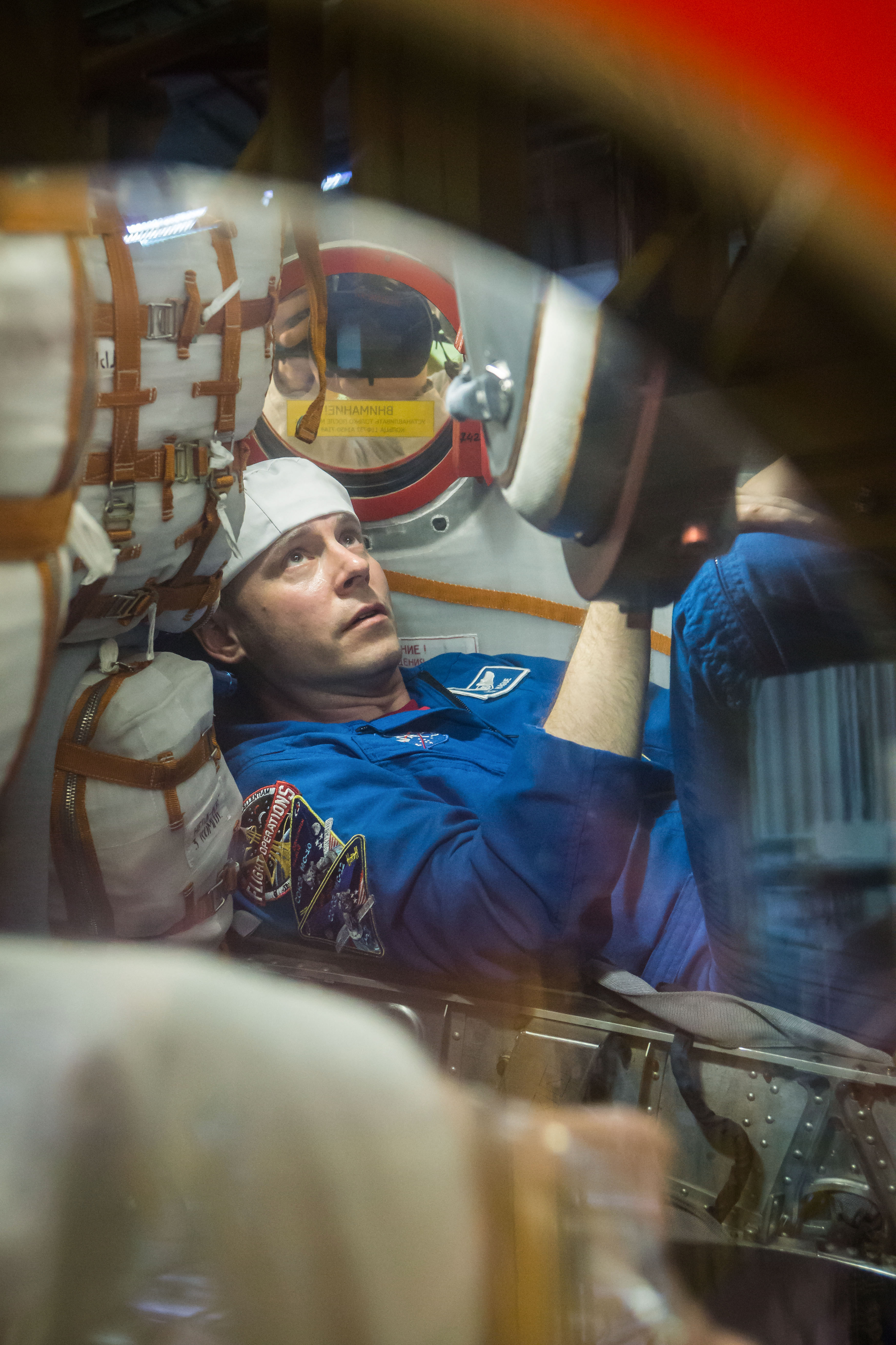 jsc2019e009944 - At the Baikonur Cosmodrome in Kazakhstan, Expedition 59 crewmember Nick Hague of NASA works inside the Soyuz MS-12 spacecraft Feb. 27 during pre-launch training. Hague, Christina Koch of NASA and Alexey Ovchinin of Roscosmos will launch M
