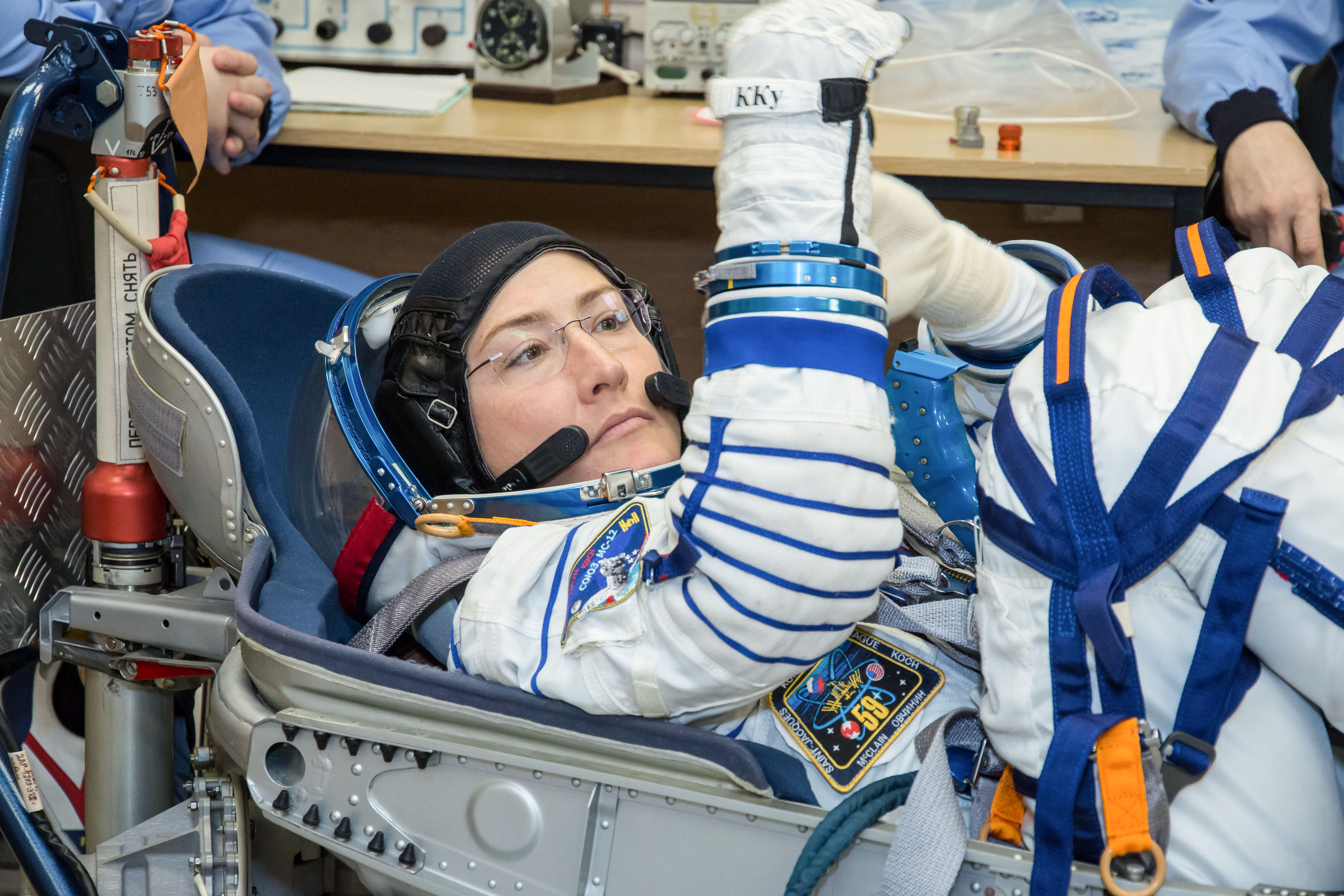 jsc2019e009953 - At the Baikonur Cosmodrome in Kazakhstan, Expedition 59 crewmember Christina Koch of NASA undergoes a Sokol launch suit pressure check Feb. 27 during pre-launch training. Koch, Nick Hague of NASA and Alexey Ovchinin of Roscosmos will laun