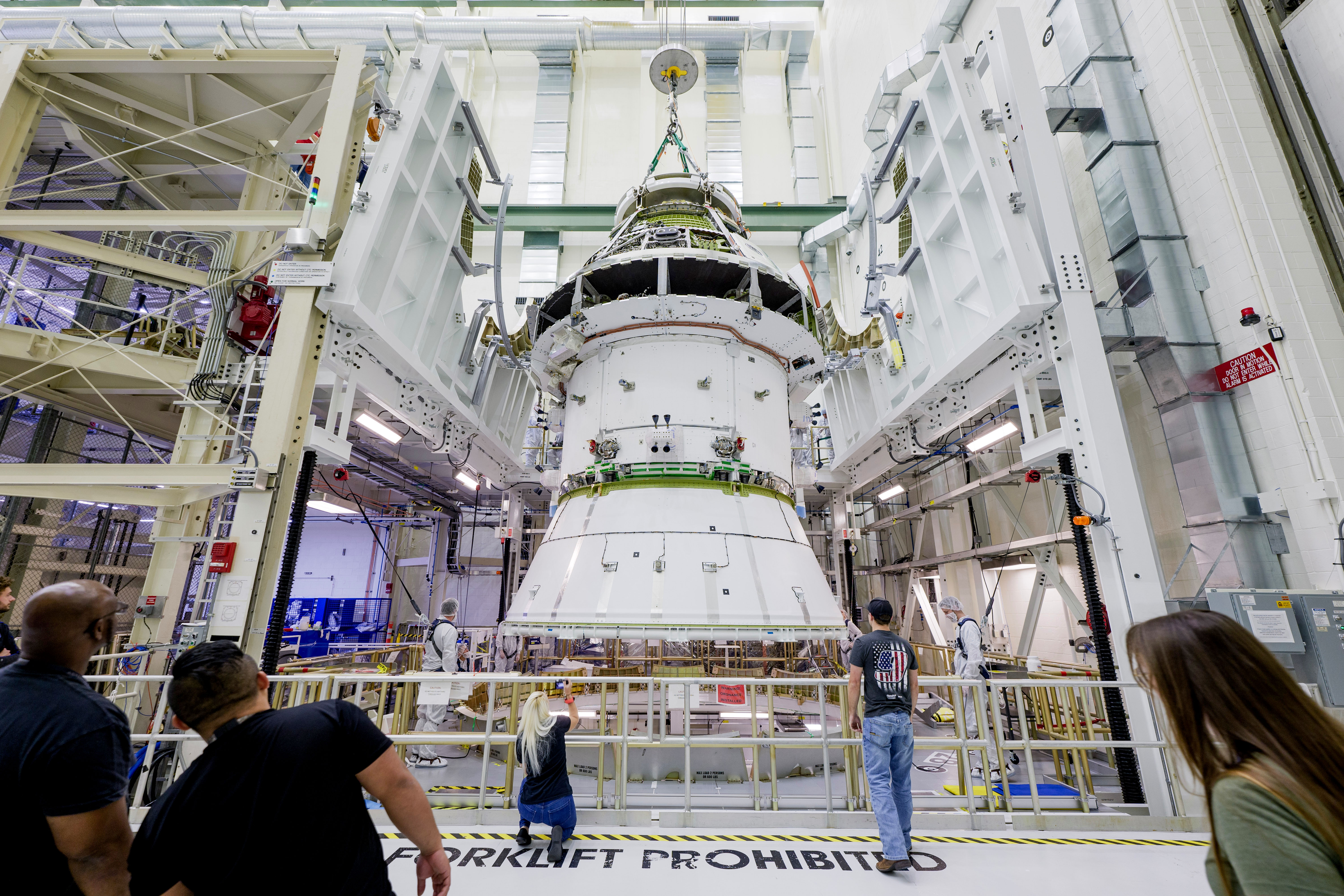 Artemis II Orion Spacecraft Lifted into Vacuum Chamber for Second Round of Testing