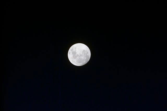 Full moon as seen from STS-103 orbiter Discovery.