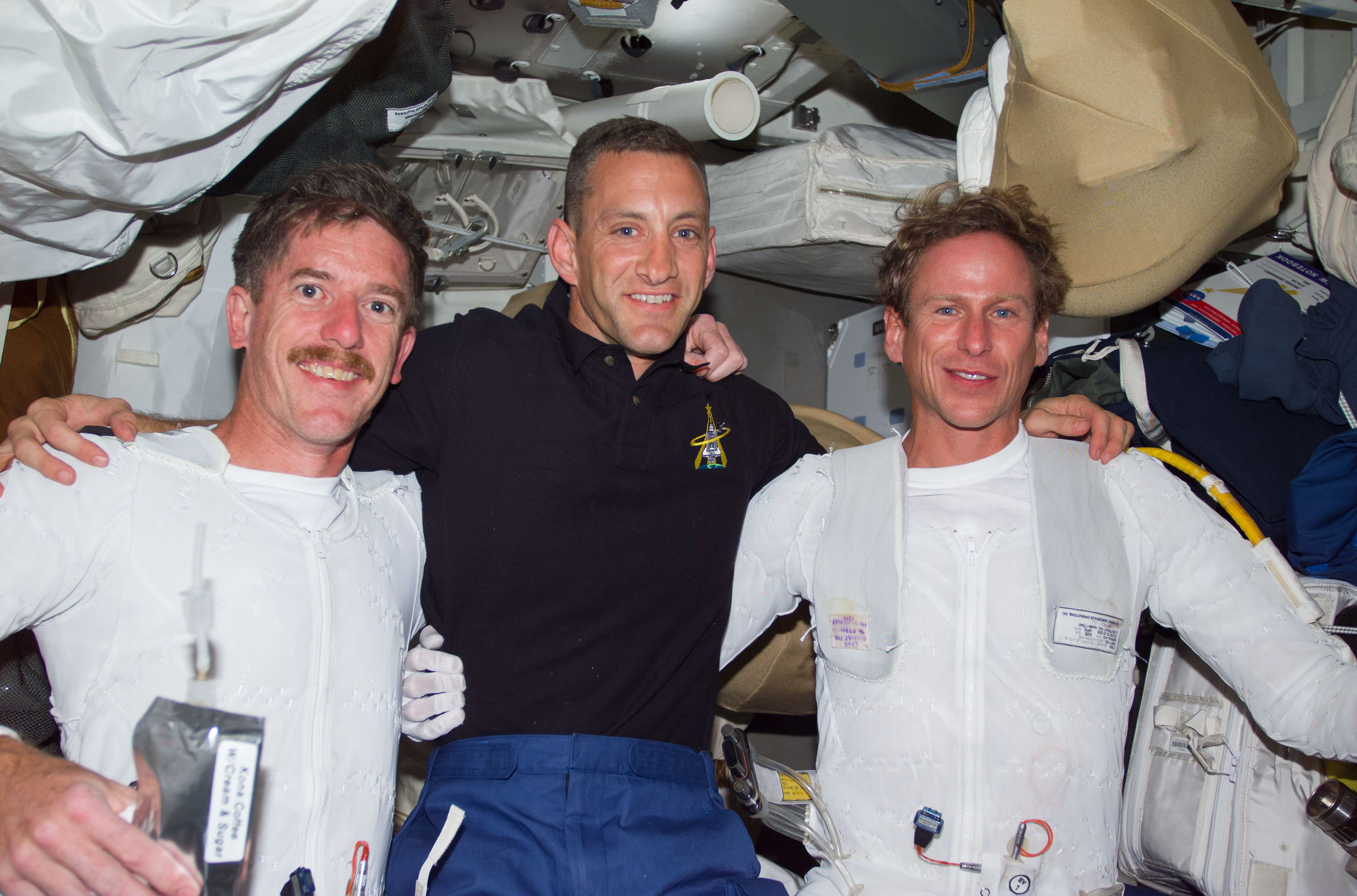 Reilly, Gernhardt and Hobaugh on middeck after EVA 1