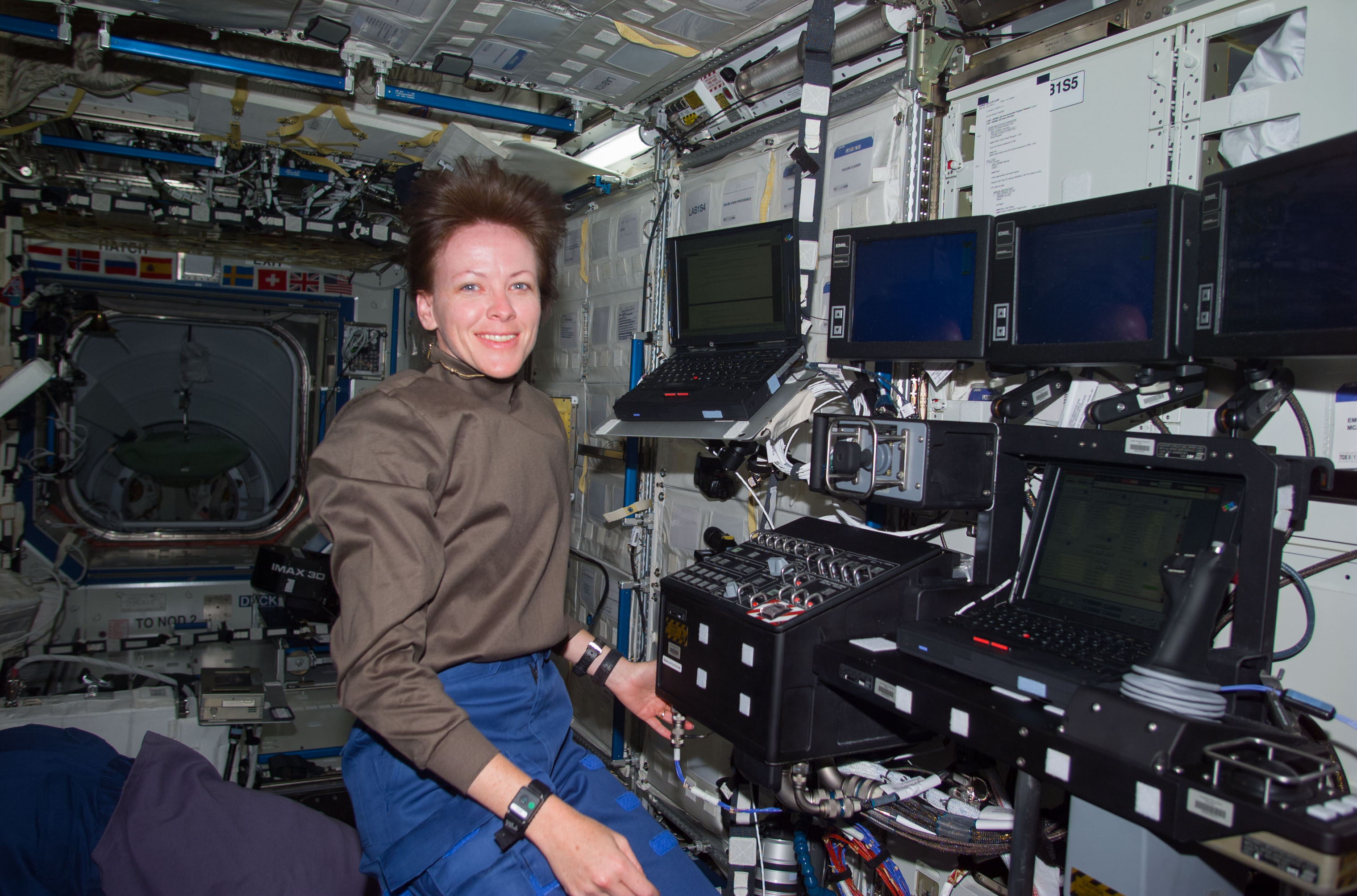 Kavandi at controls of Canadarm2 in Destiny module