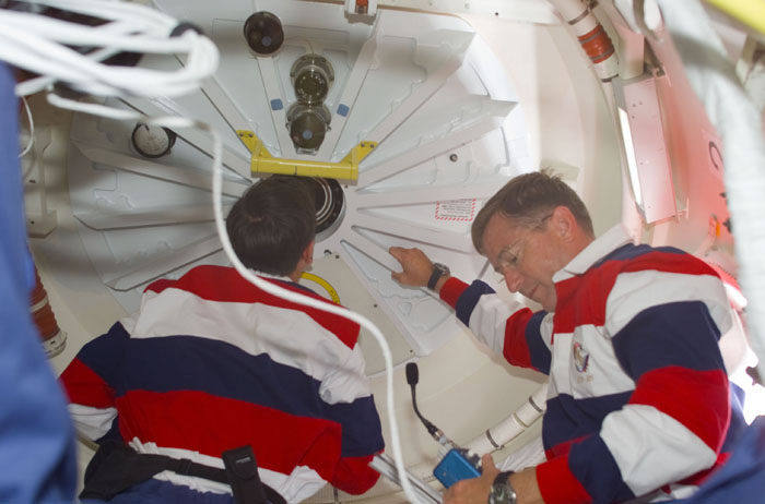 Culbertson and Horowitz prepare to open the ODS hatch into the ISS