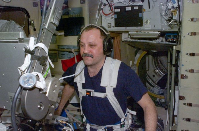 Usachev exercises on the ISS Service Module/Zvezda treadmill