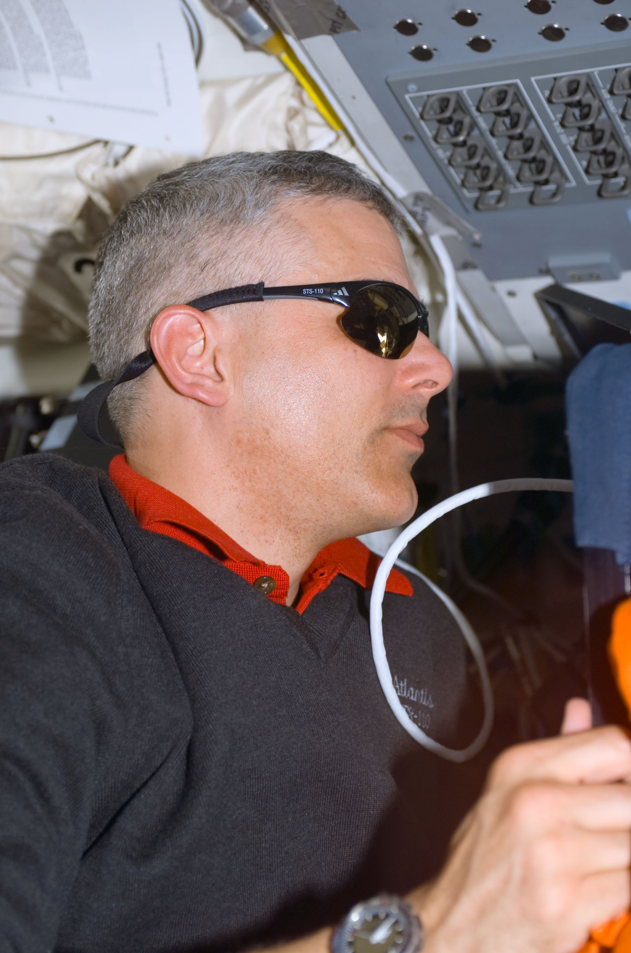 MS Morin works on the aft flight deck of Atlantis during STS-110