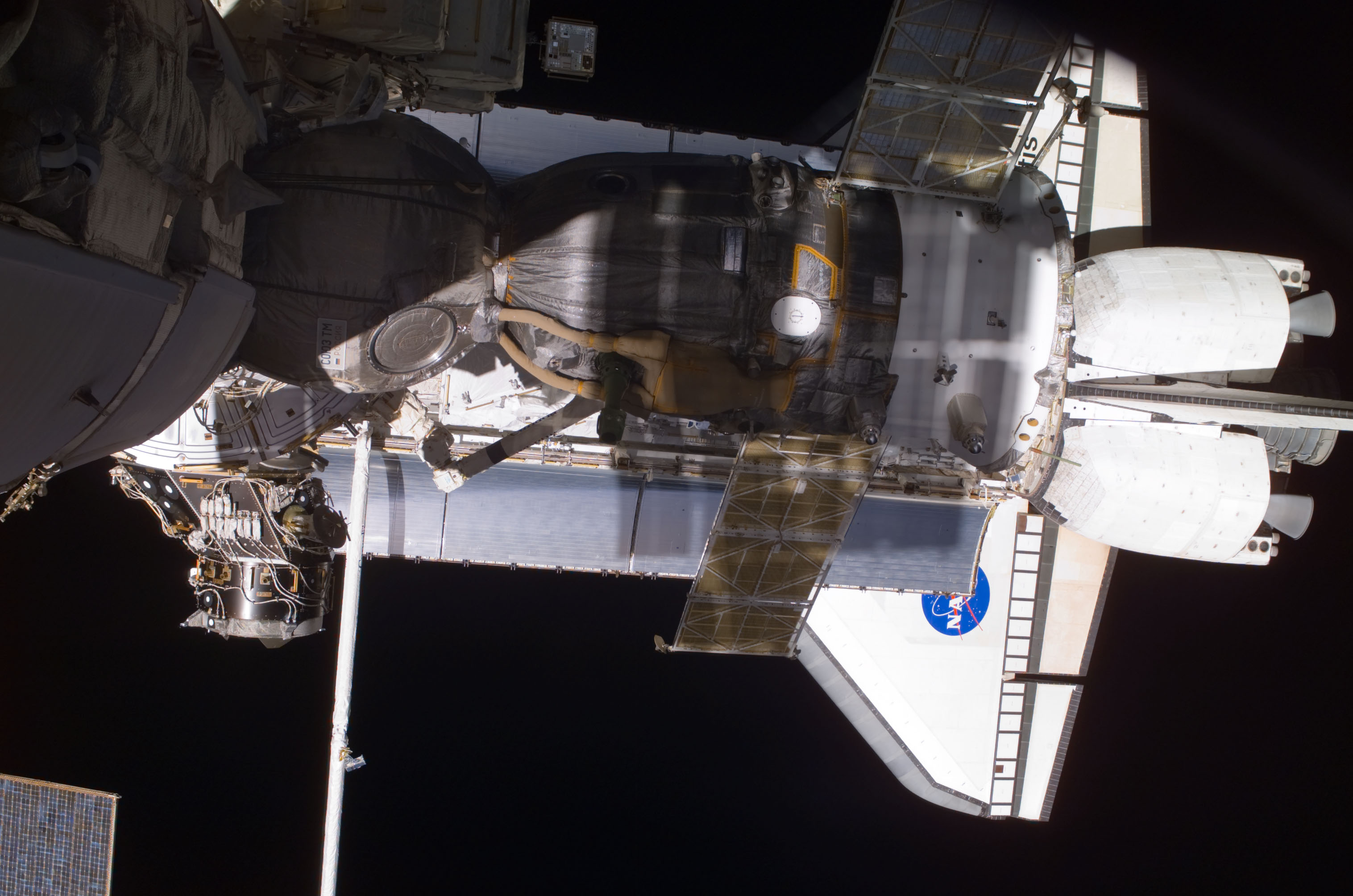 View of the Soyuz and Atlantis' payload bay taken during STS-110's visit to the ISS