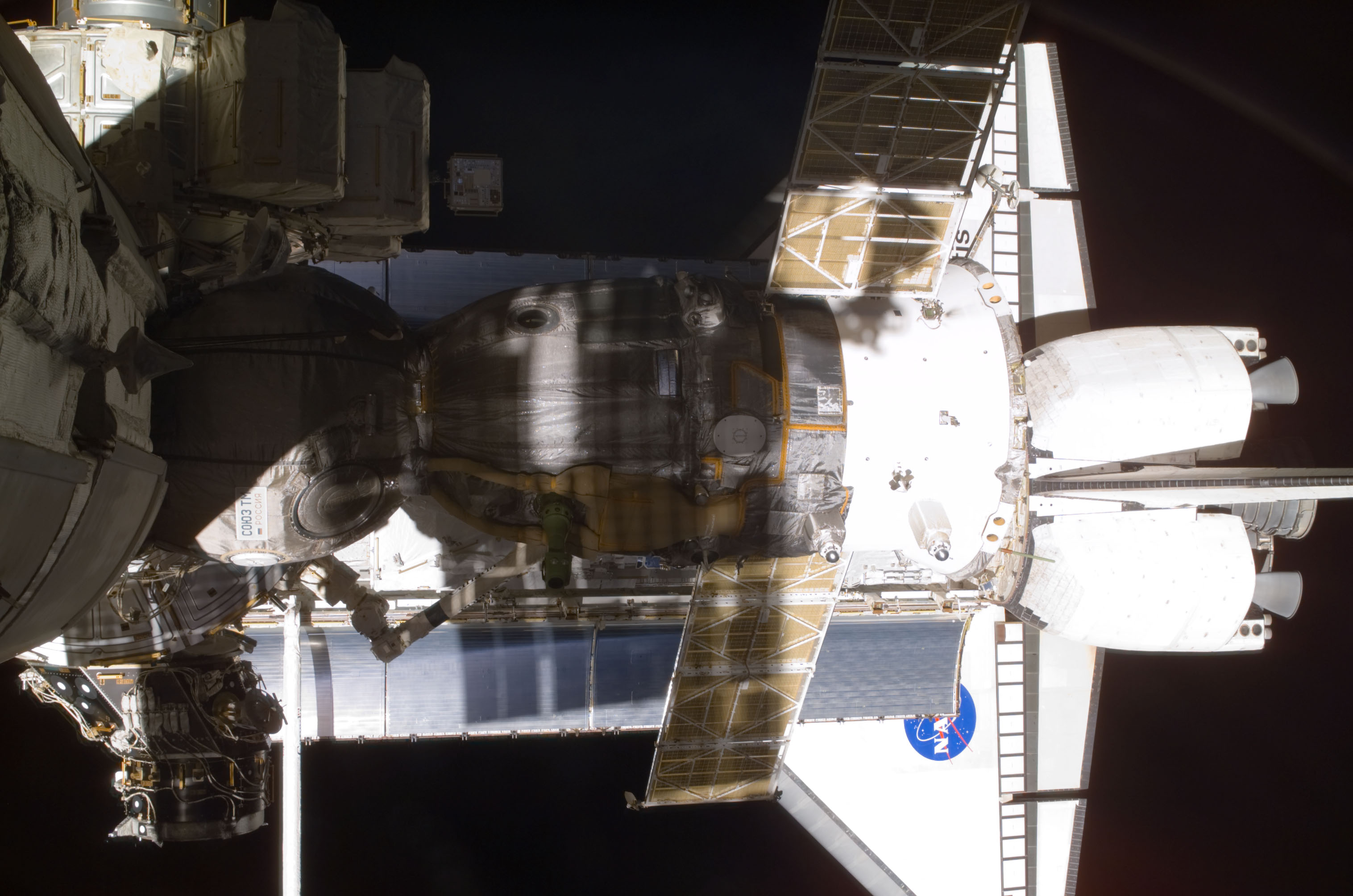 View of the Soyuz and Atlantis' payload bay taken during STS-110's visit to the ISS