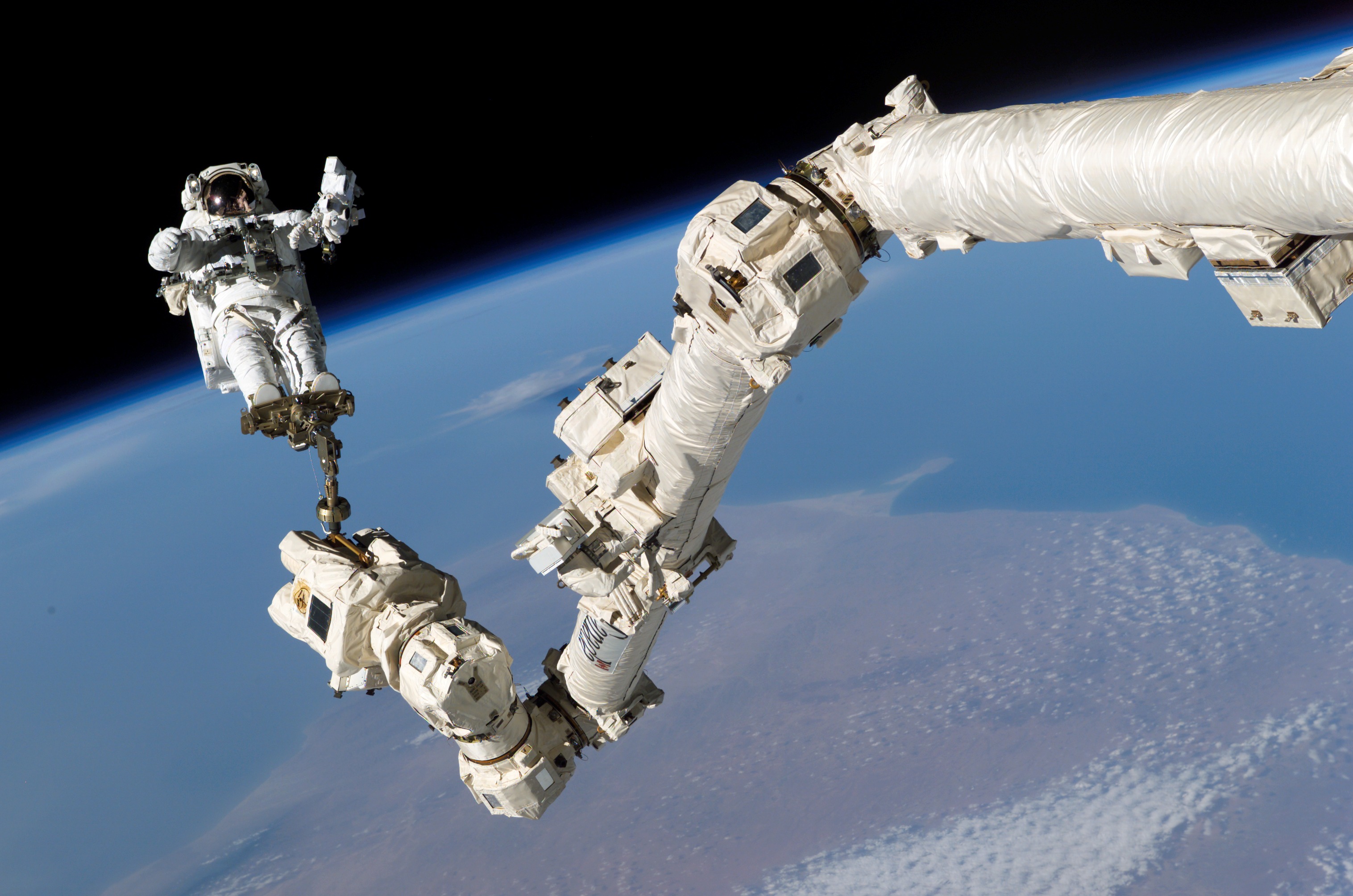 EVA 3 - Robinson on Canadarm2