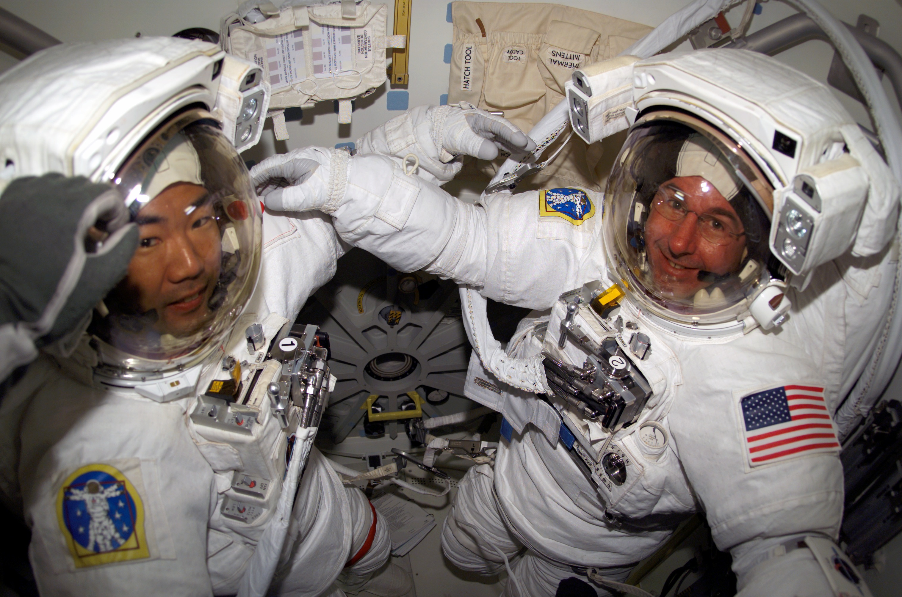 Noguchi and Robinson in Airlock