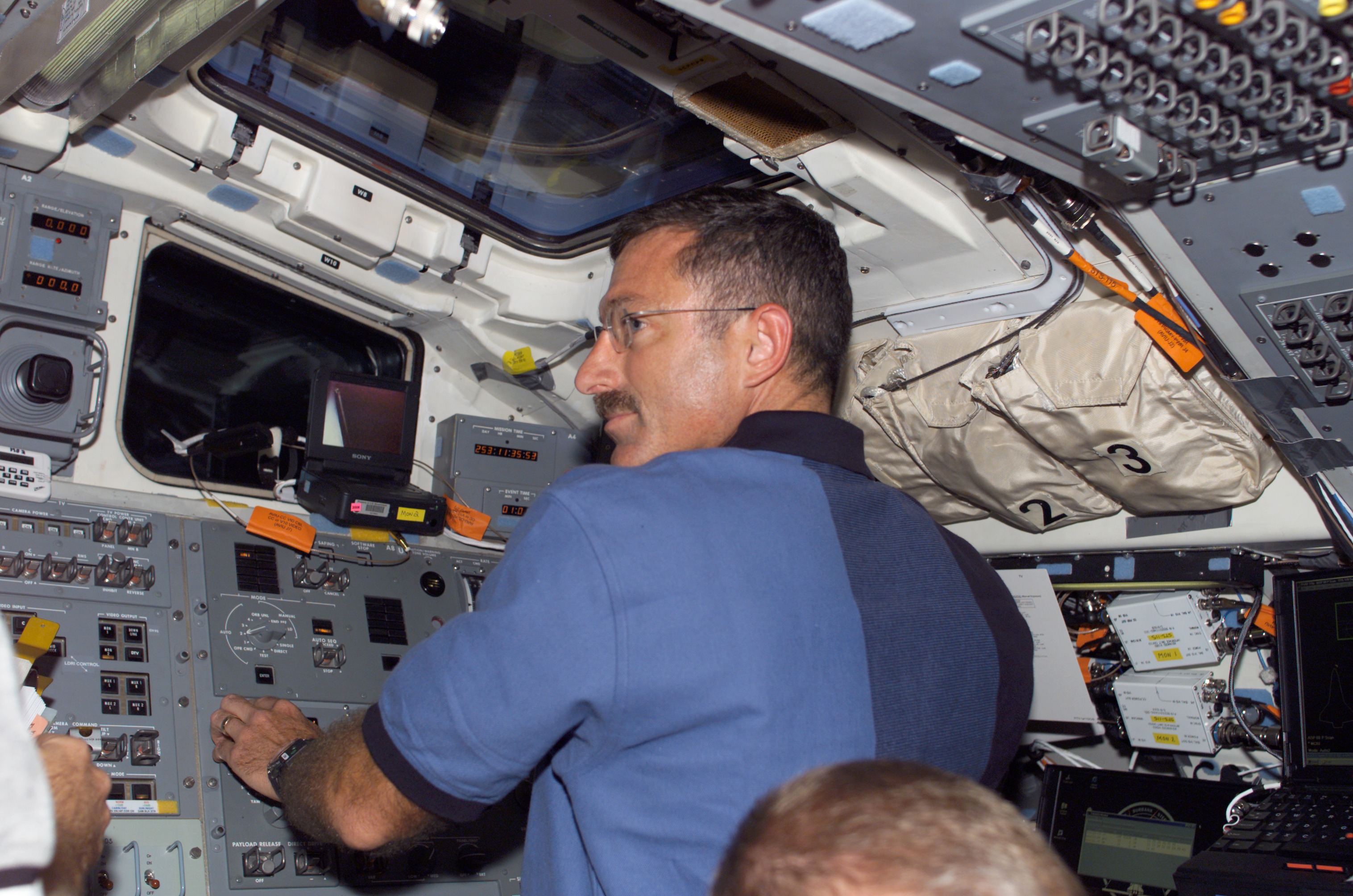 STS-115 MS Burbank on Atlantis Aft Flight Deck