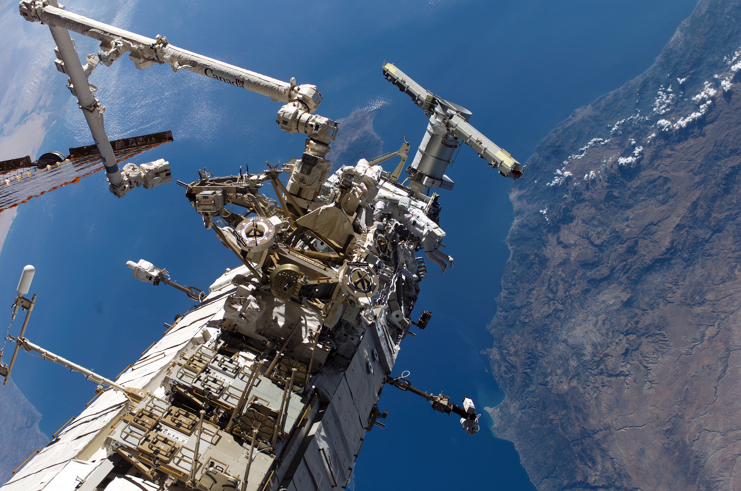 MacLean and Burbank performing second EVA spacewalk