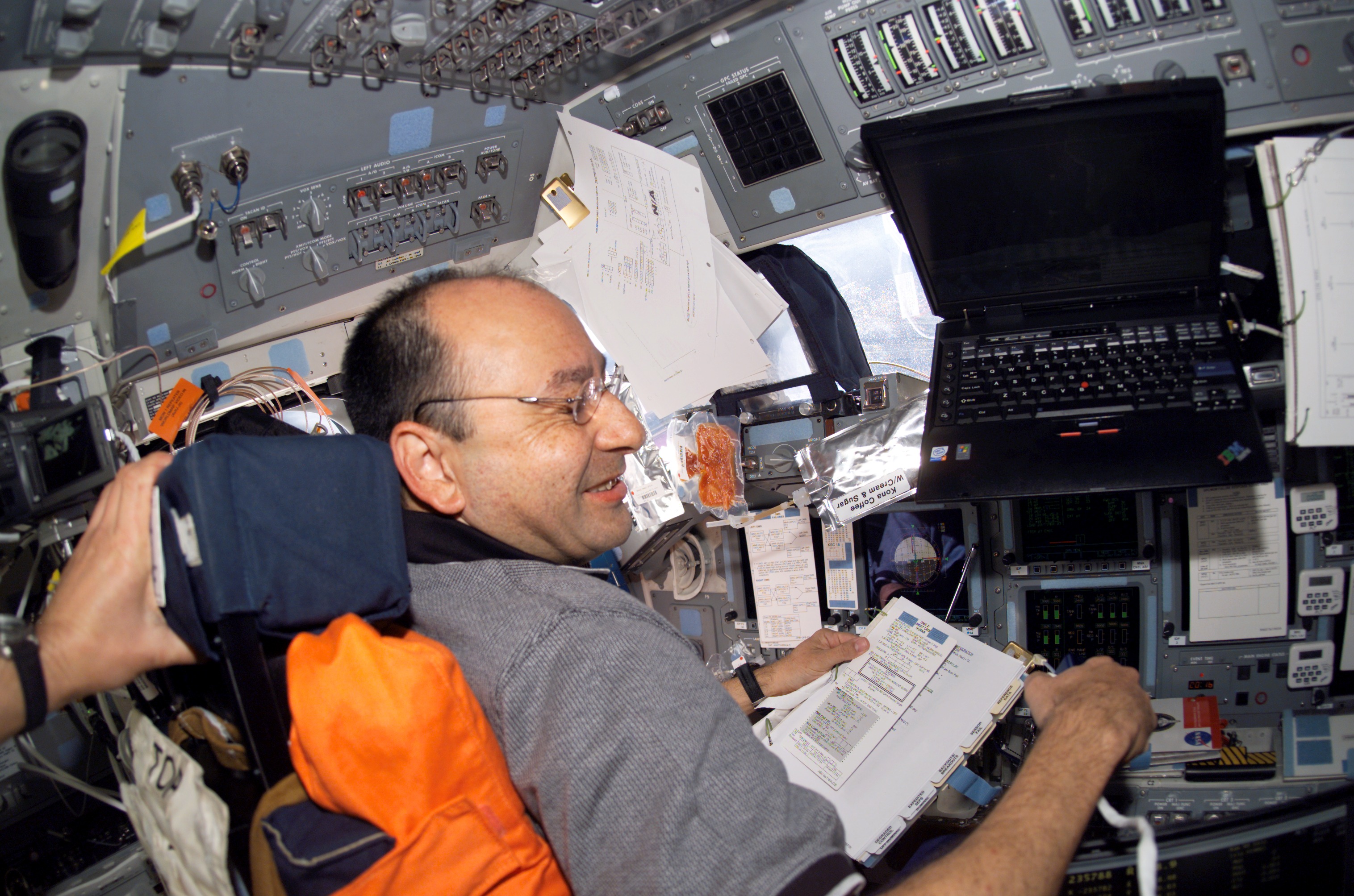 STS-116 Commander Polansky in the FD on Space Shuttle Discovery