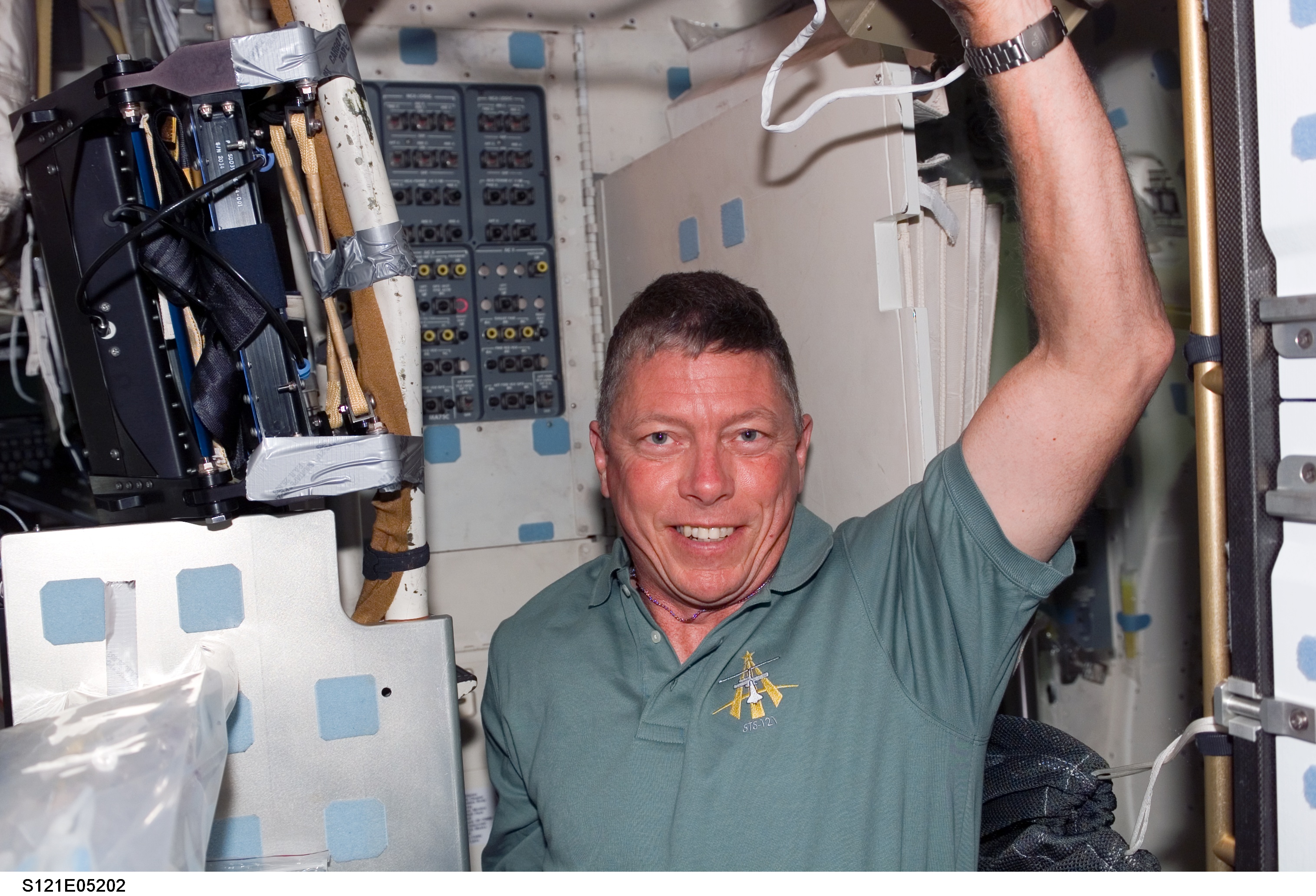 Fossum poses for a picture in the MDK during STS-121