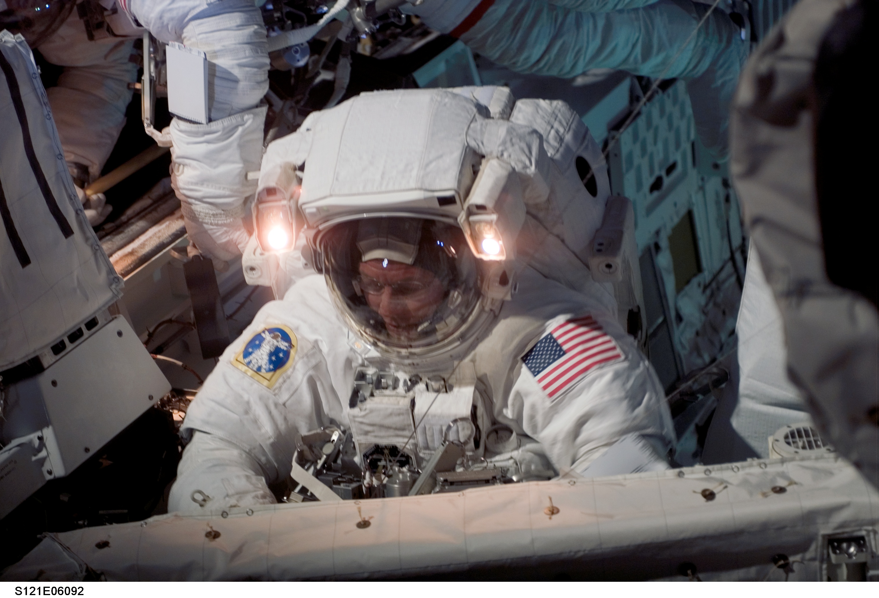 Fossum at the orbiter BKHD after completing the task for EVA1 on STS-121 / Expedition 13 joint operations