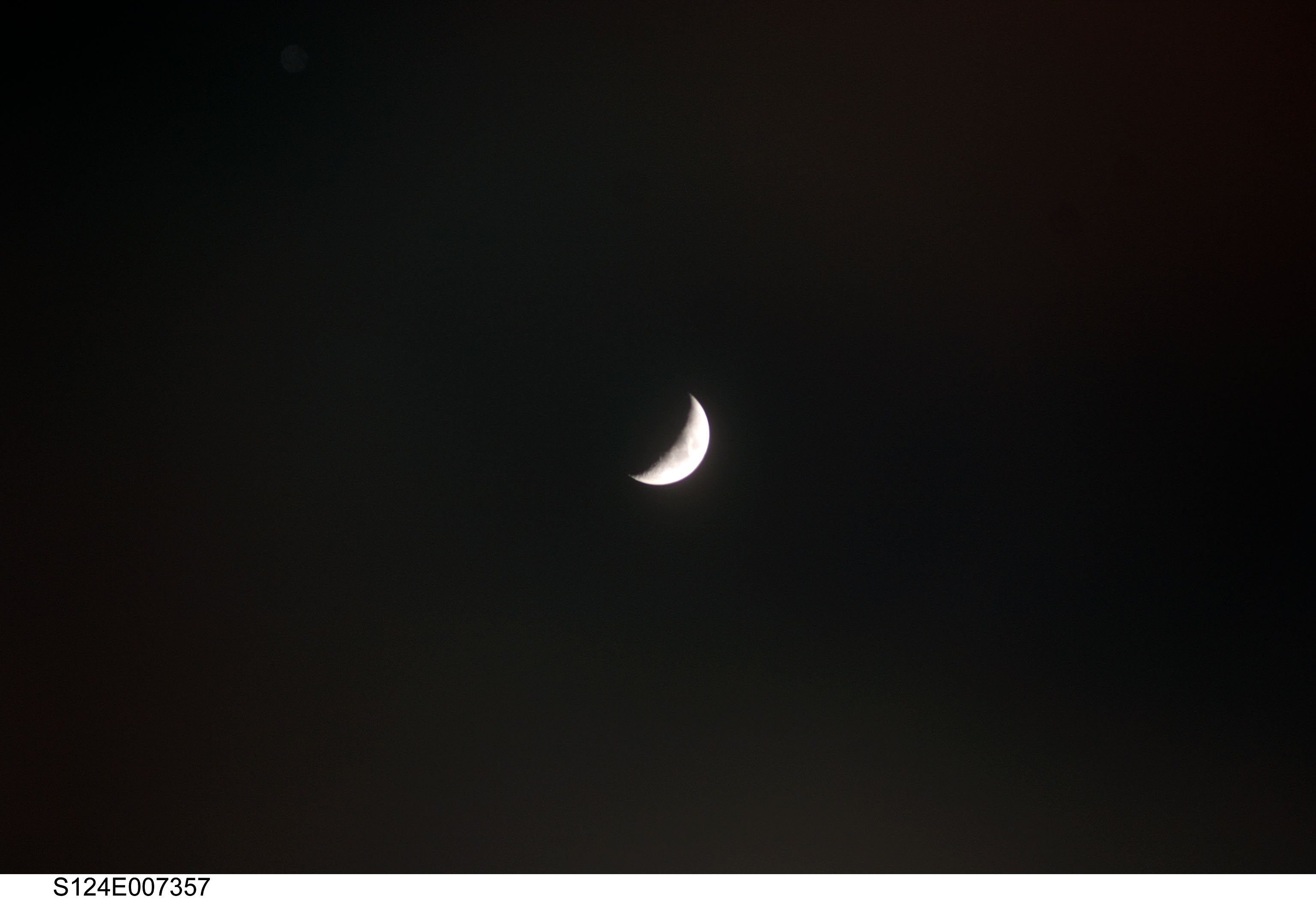 Cresent moon seen by STS-124 crew