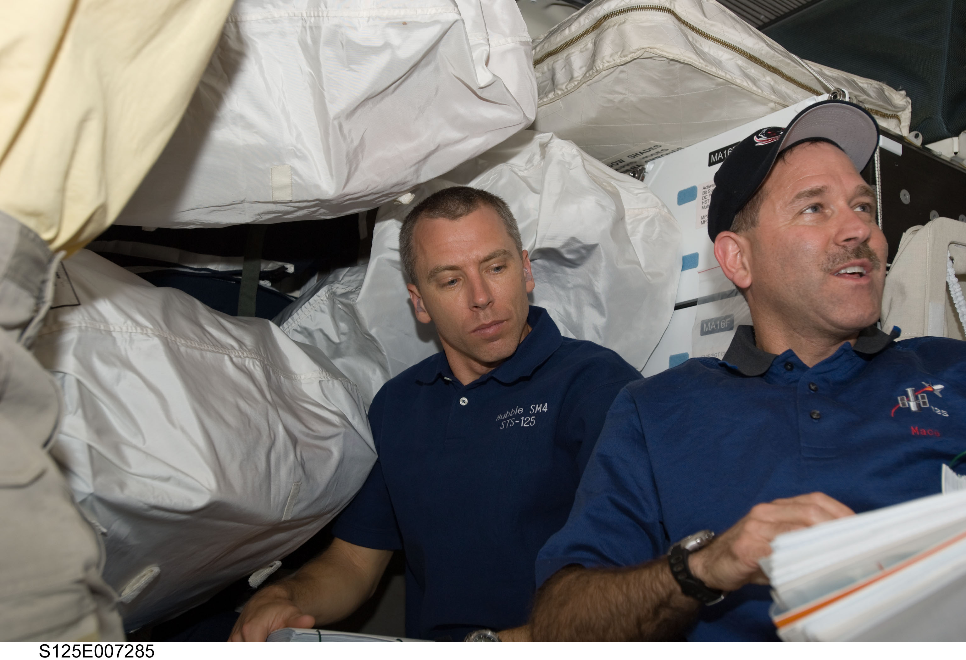 STS-125 Crew Members in the Middeck during Flight Day 3