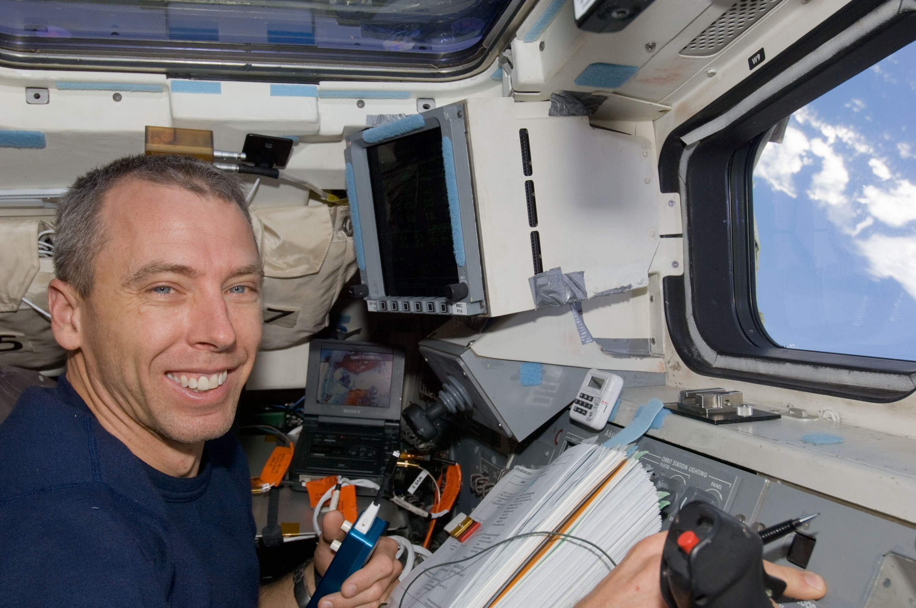 STS-125 MS5 Andrew Feustel works on the Flight Deck during Flight Day 7