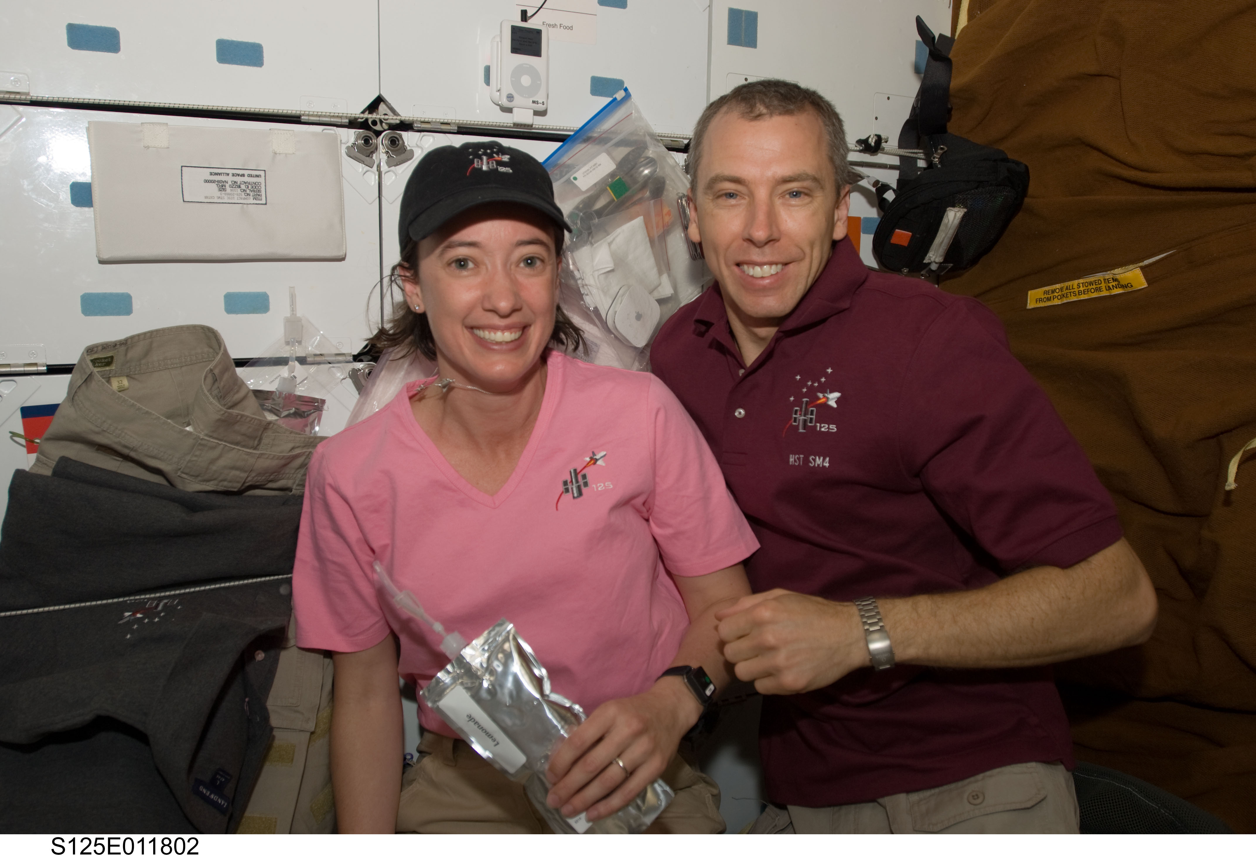 View of STS-125 Crew Members on the Middeck