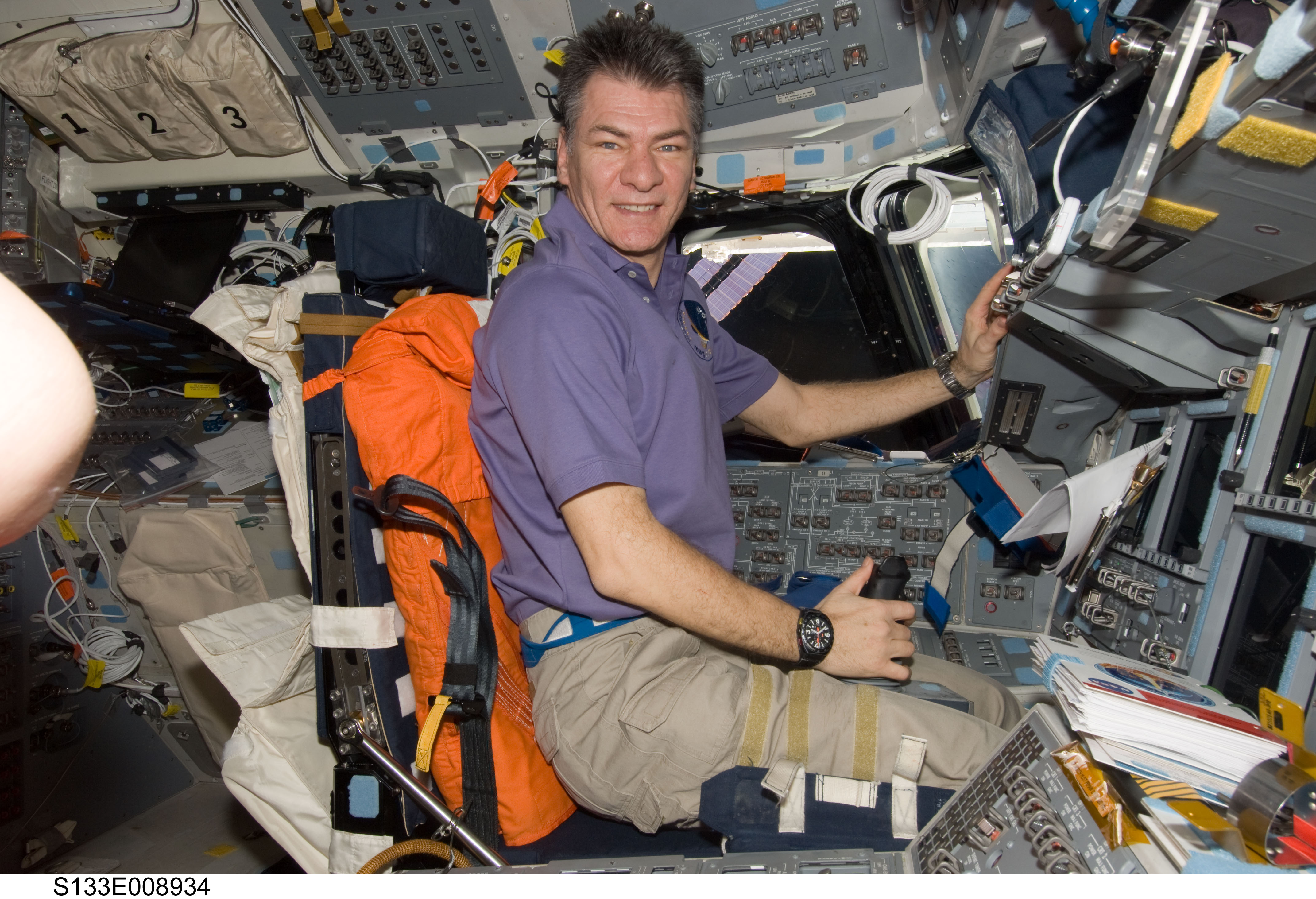 Nespoli on Discovery forward flight deck.