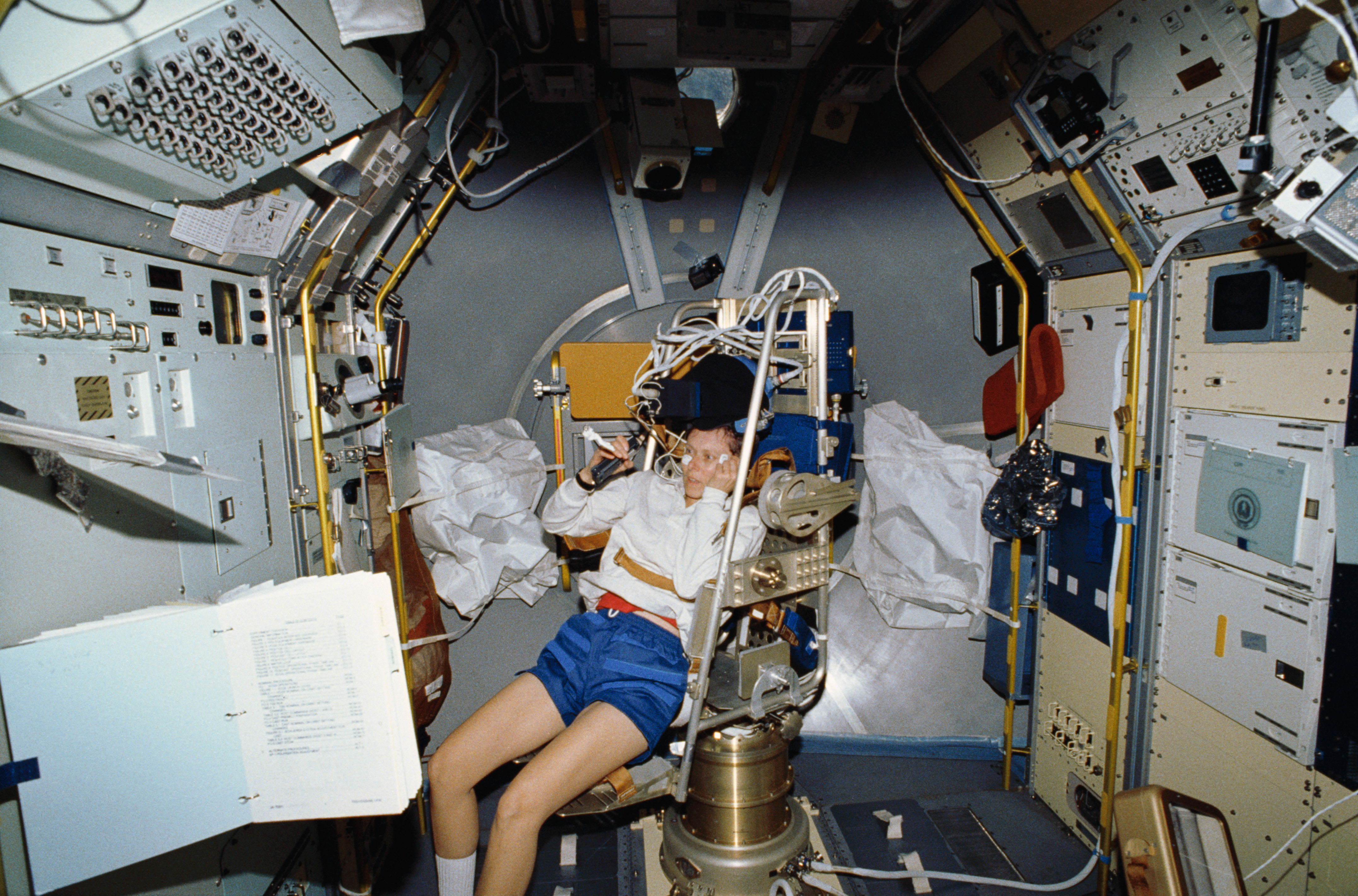 STS-42 Payload Specialist (MS) Bondar in IML-1's MVI rotator chair