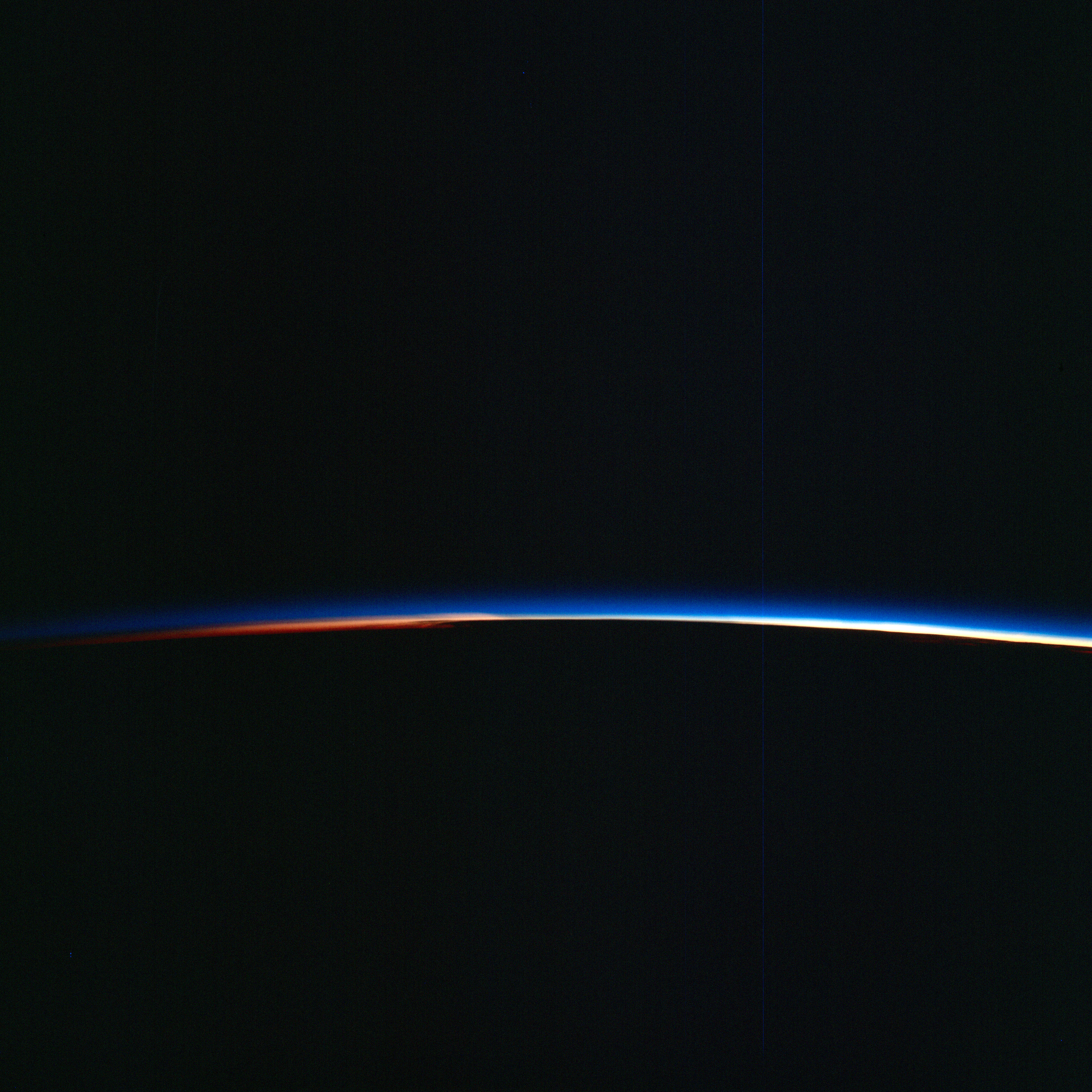 Earth's limb at sunrise as seen from the Gemini 9-A spacecraft