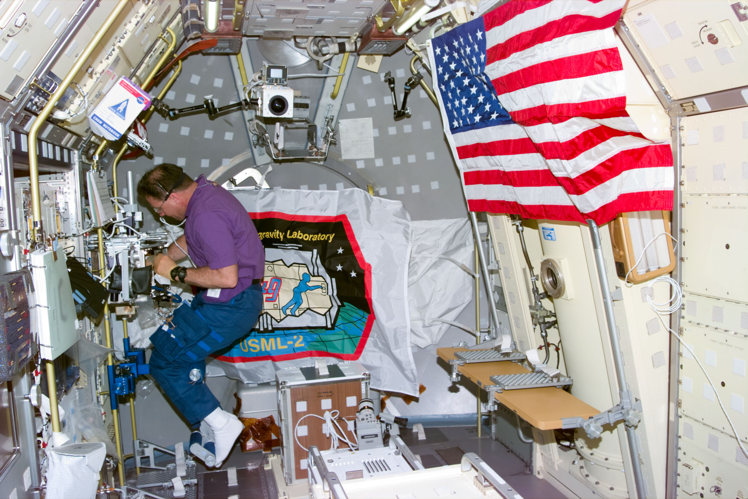 PCG-GBX, Payload Specialist Albert Sacco works at glovebox