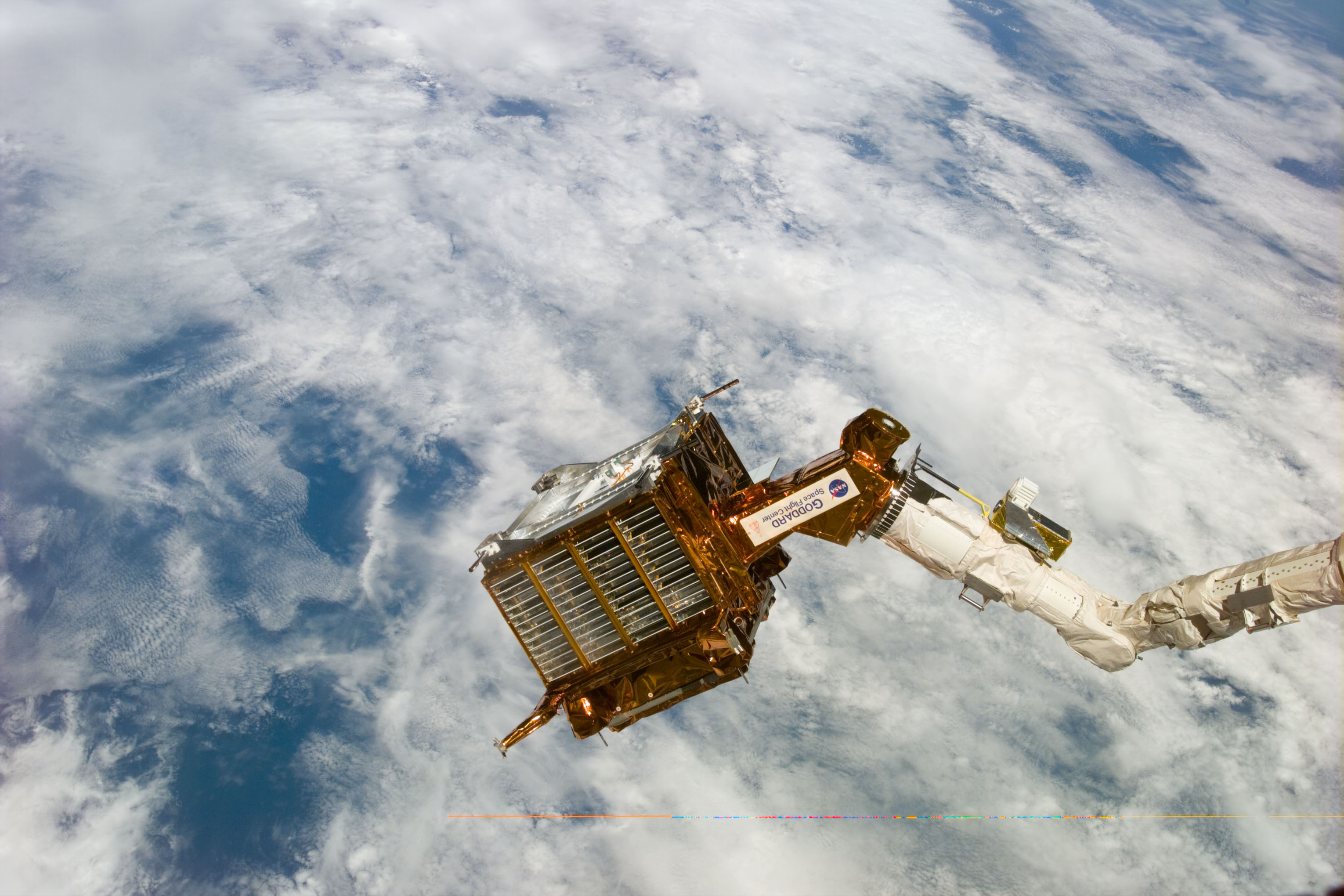 SPARTAN satellite on RMS arm