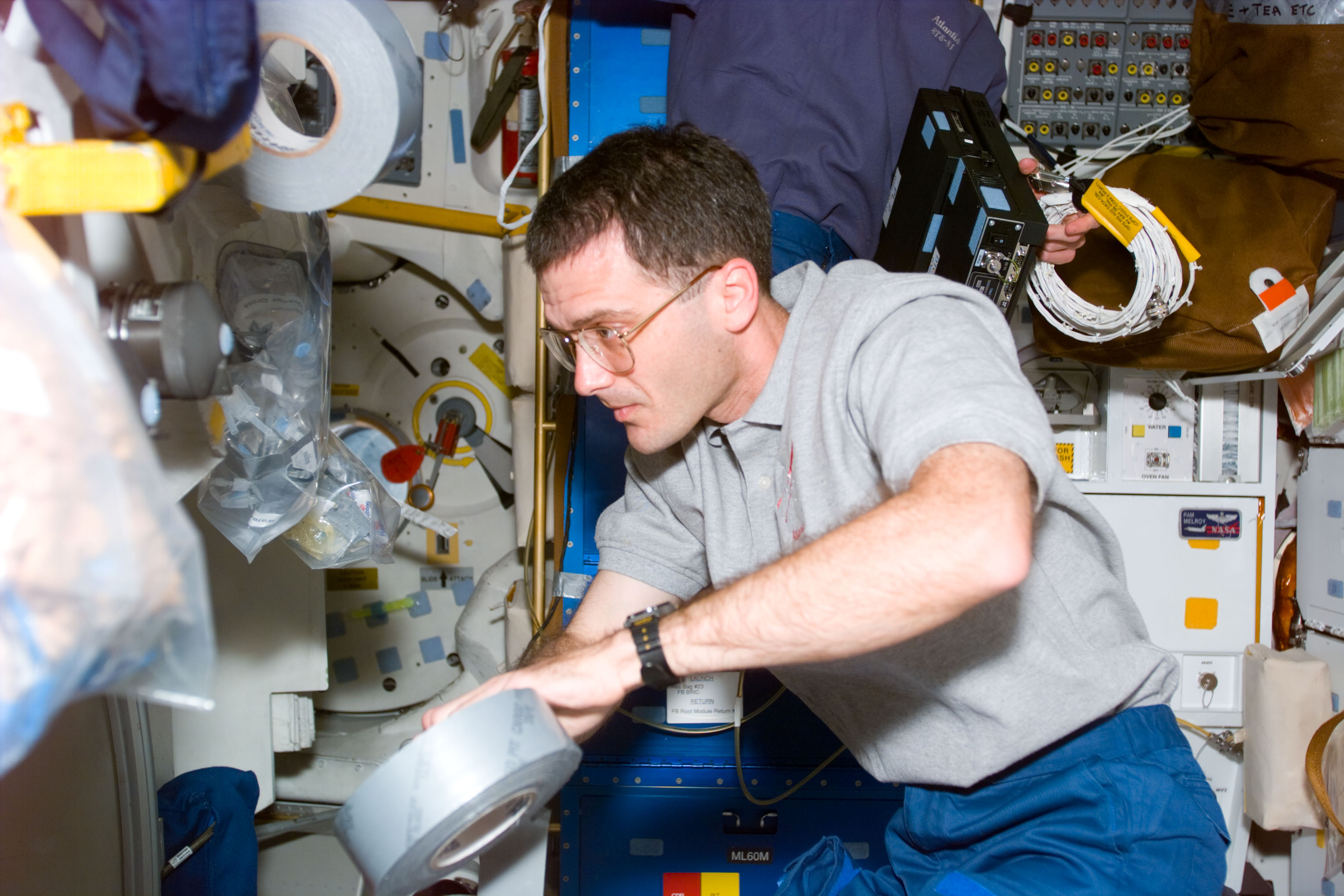 MS Wisoff with duct tape on the middeck