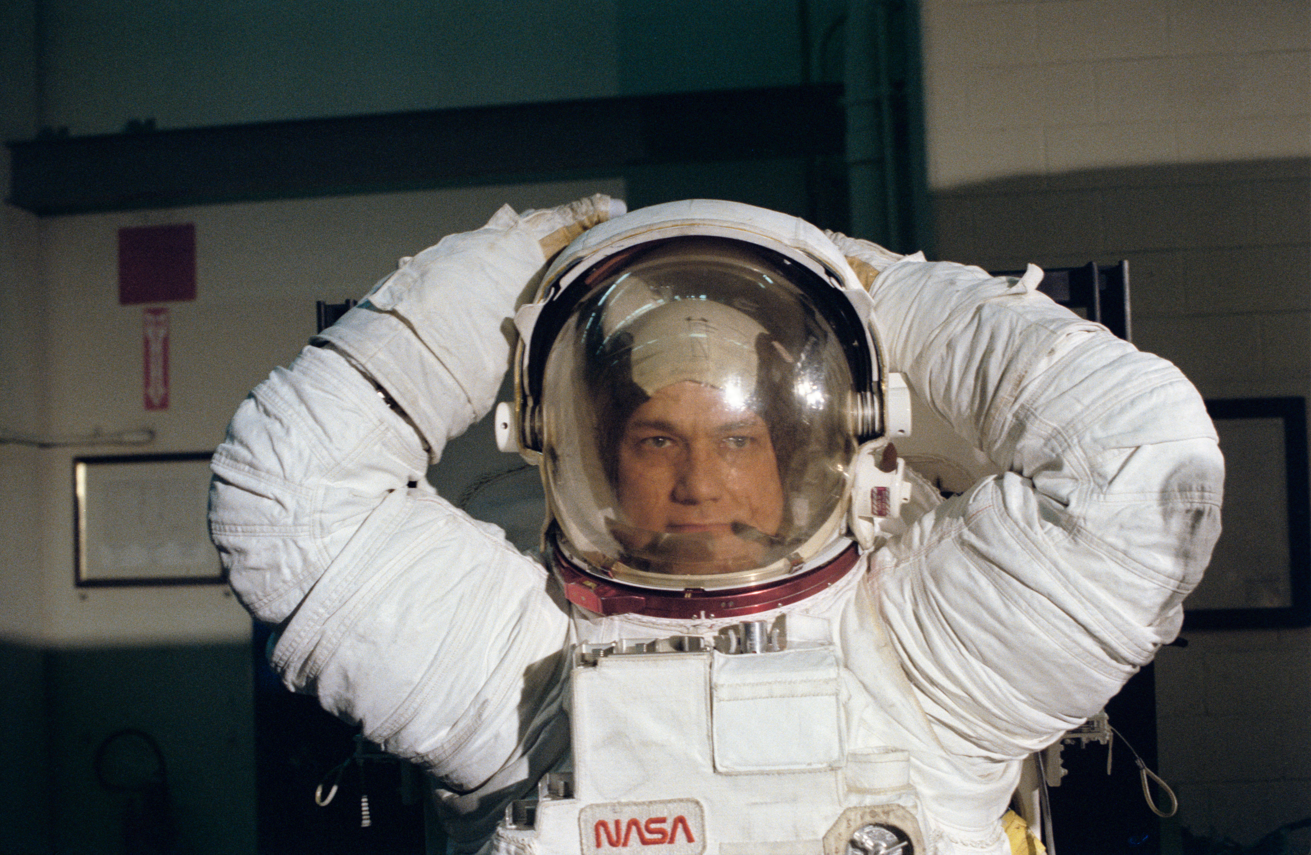 Astronaut Bruce McCandless modeling the EMU/MMU