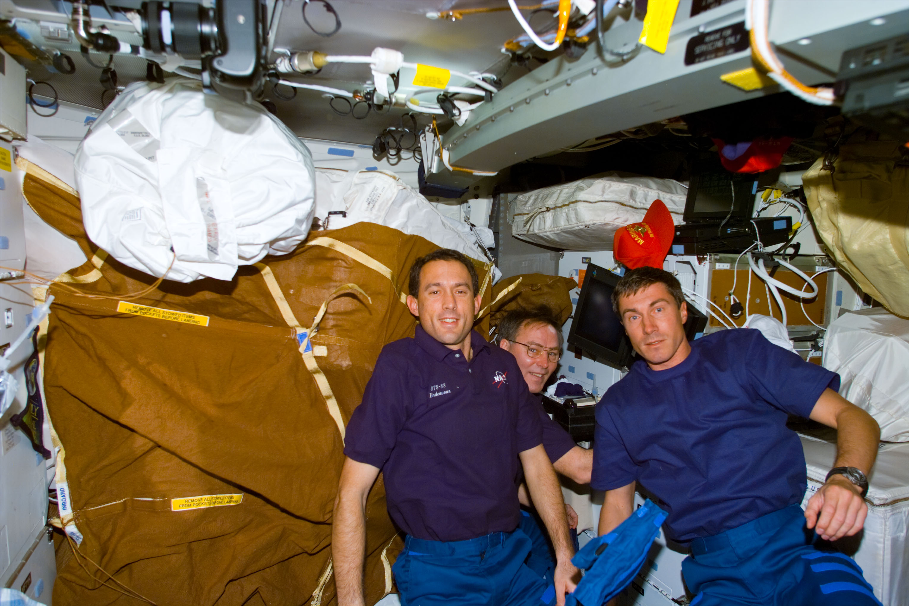 Newman, Krikalev and Ross on Endeavour's middeck