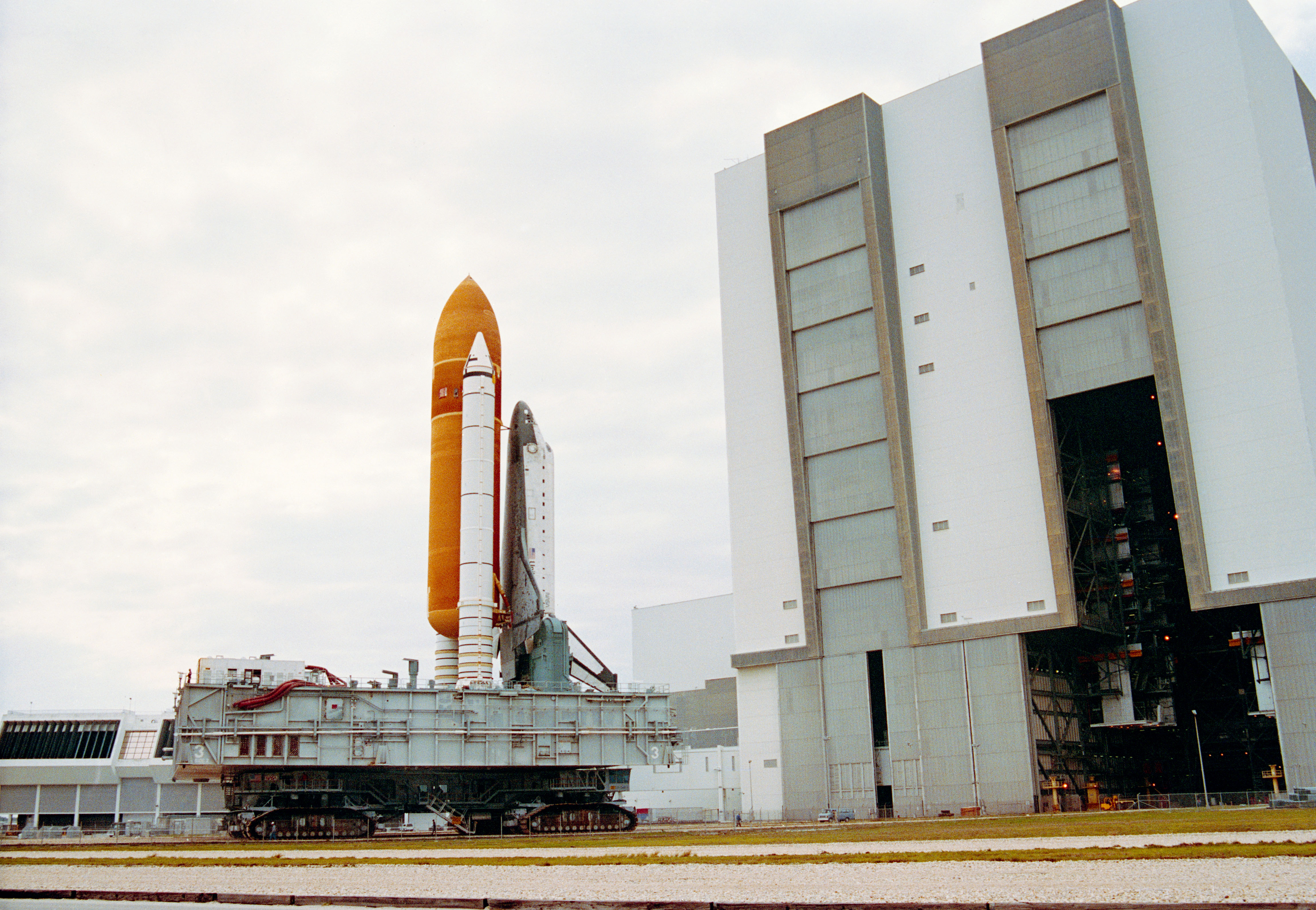 STS-55 Columbia, OV-102, mated to the ET and SRBs is rolled out of KSC's VAB
