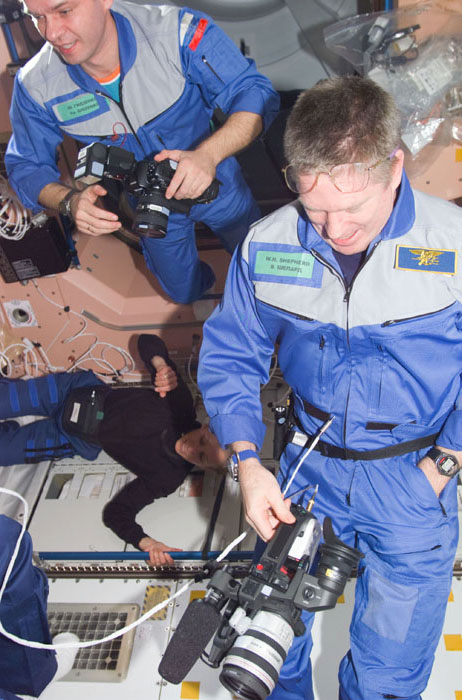 Expedition One crewmembers with cameras