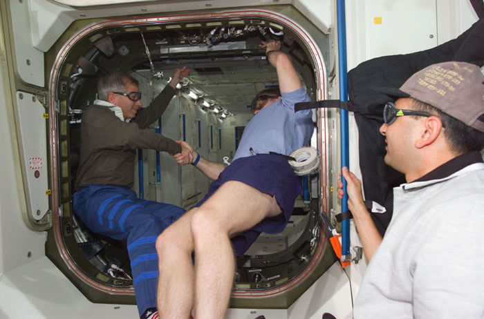 Astronauts Cockrell, Shepherd and Polansky during hatch opening