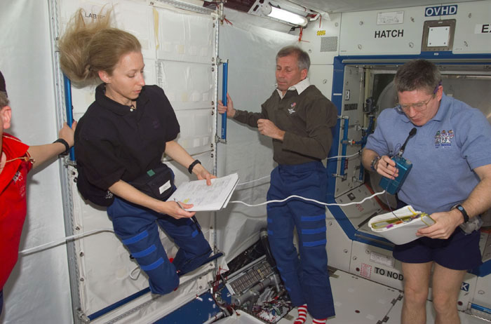 MS Ivins and Astronaut Shepherd at work in Destiny module