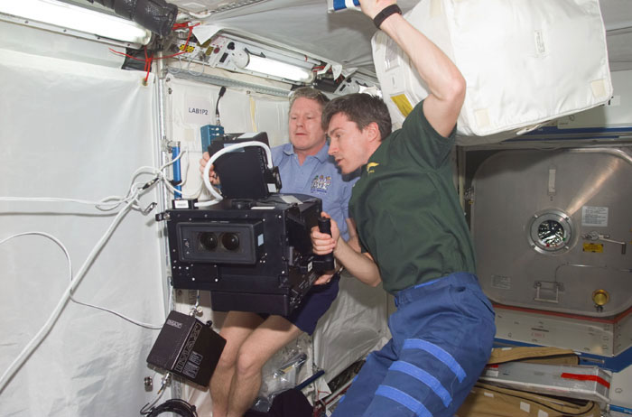 Expedition One crewmembers with IMAX camera