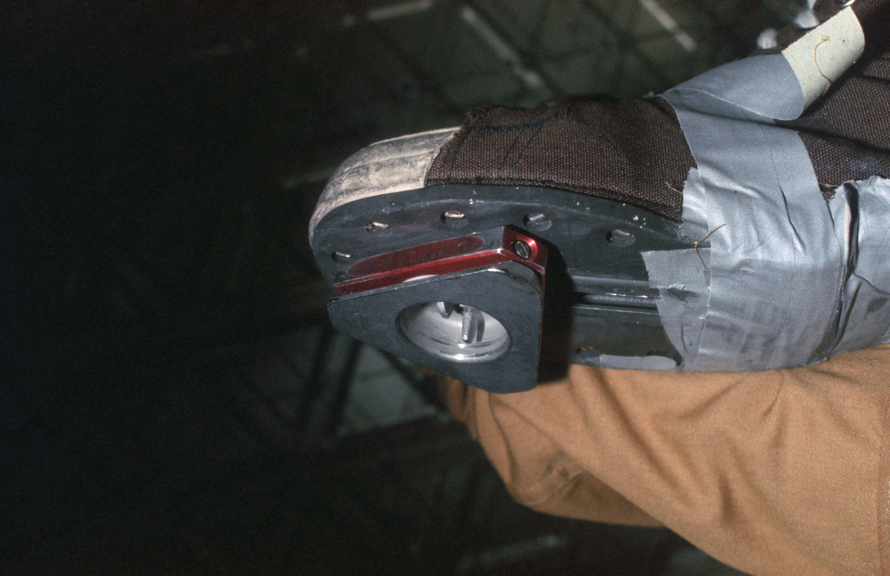View of triangle-shaped weight on bottom of astronauts shoe