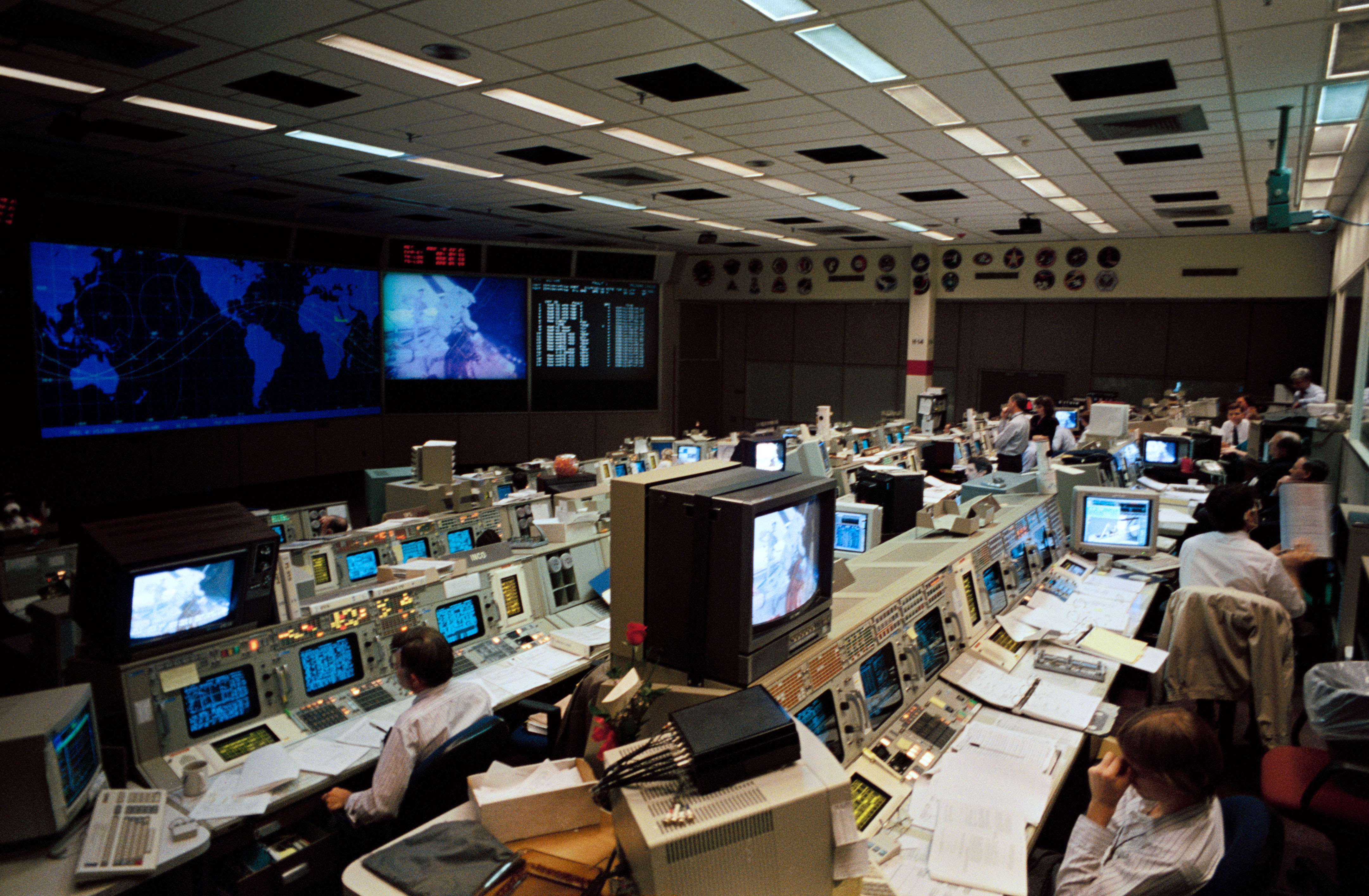 Flight controller Kevin McCluney monitors STS-61 astronauts during EVA