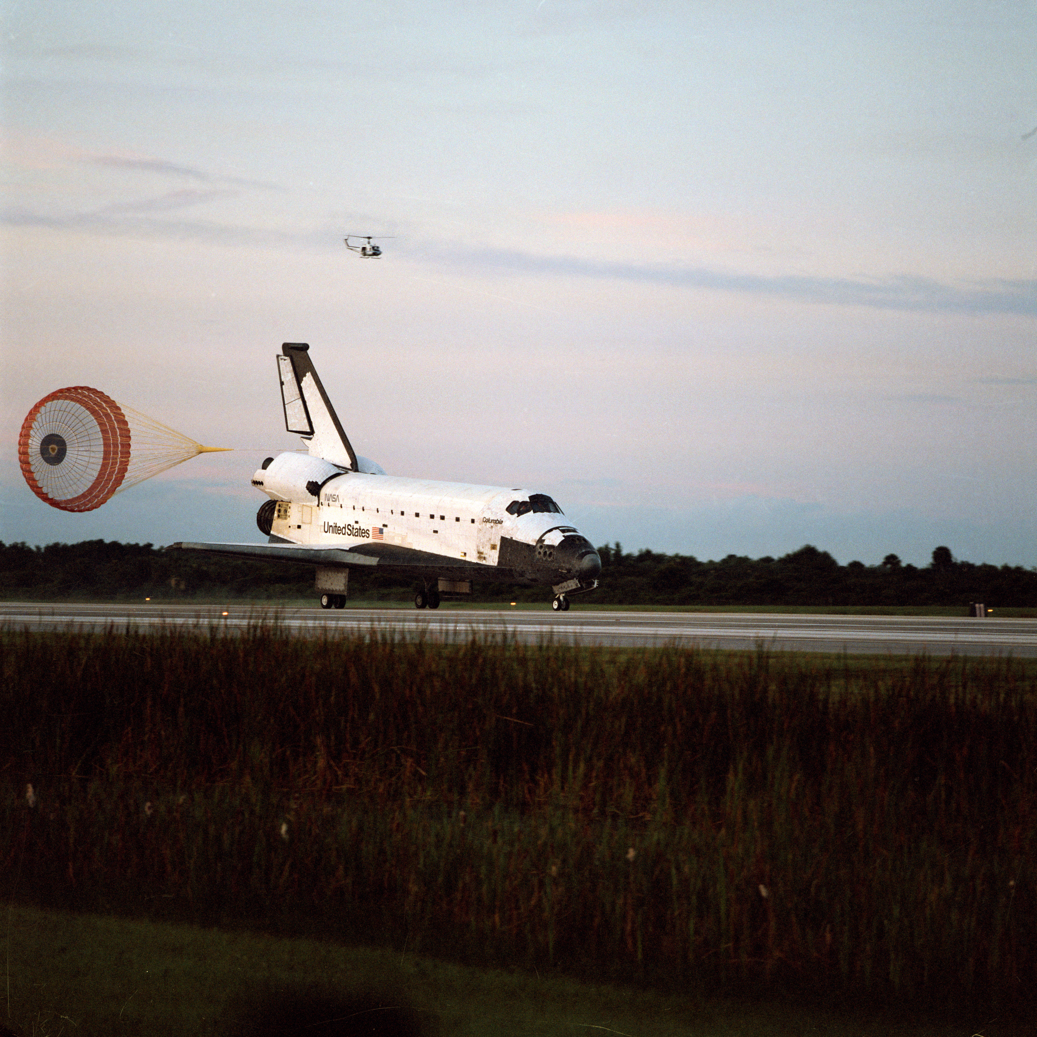 STS-65 Columbia, OV-102, with drag chute deployed lands at KSC SLF