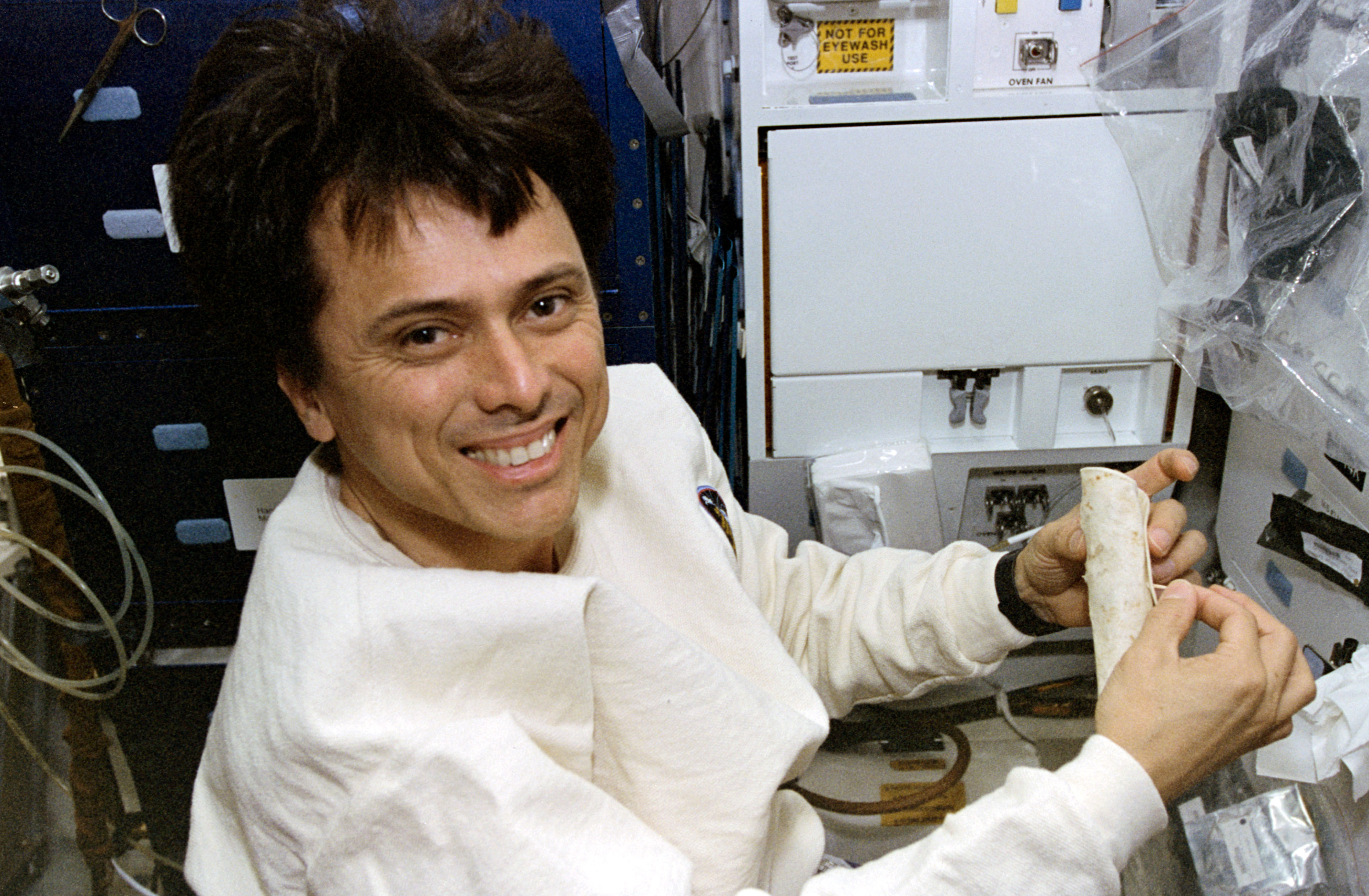 Astronaut Chang-Diaz making burritos in space