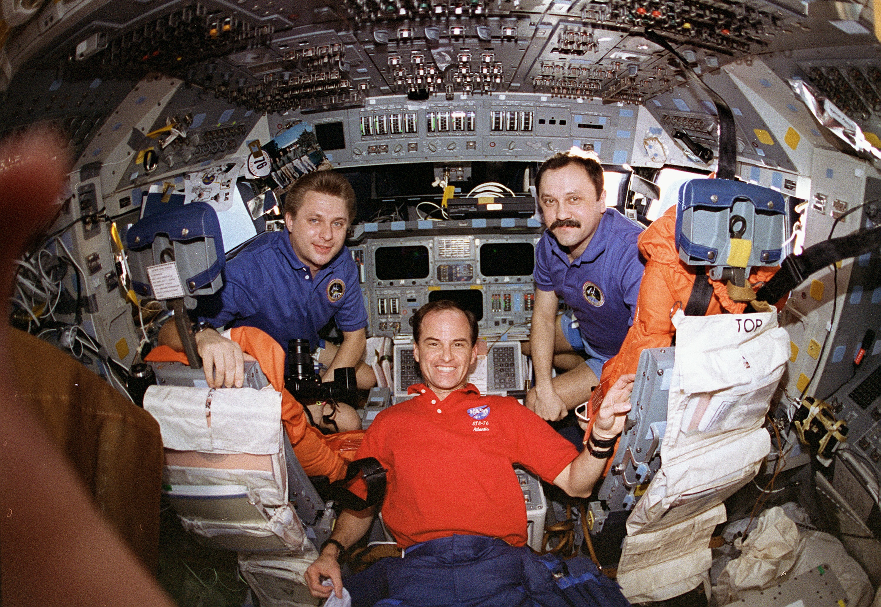 Kevin Chilton gives Onufrienko and Usachev a tour of the shuttle flight deck