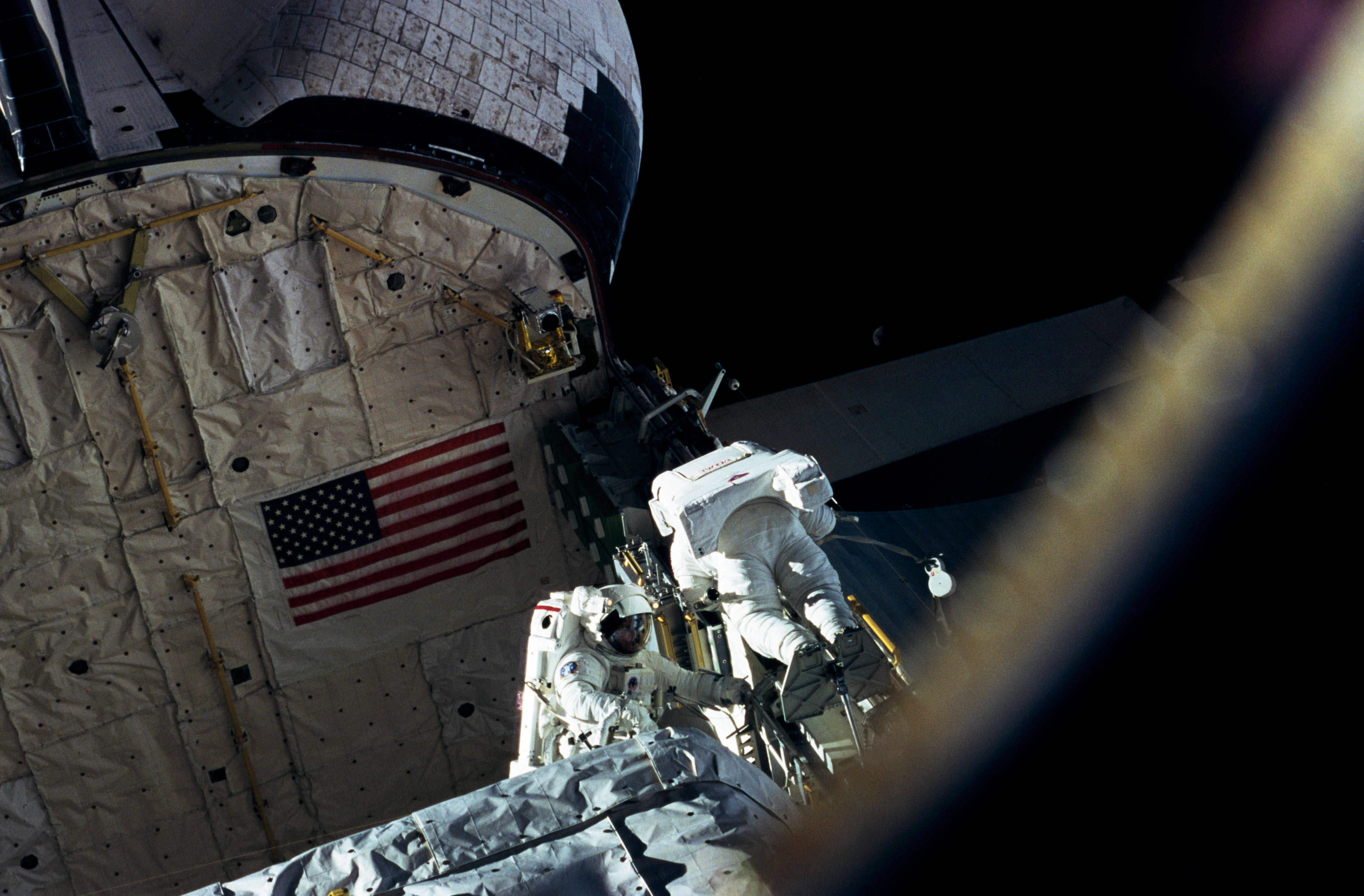 Astronauts Linda Godwin and Michael "Rich" Clifford perform EVA