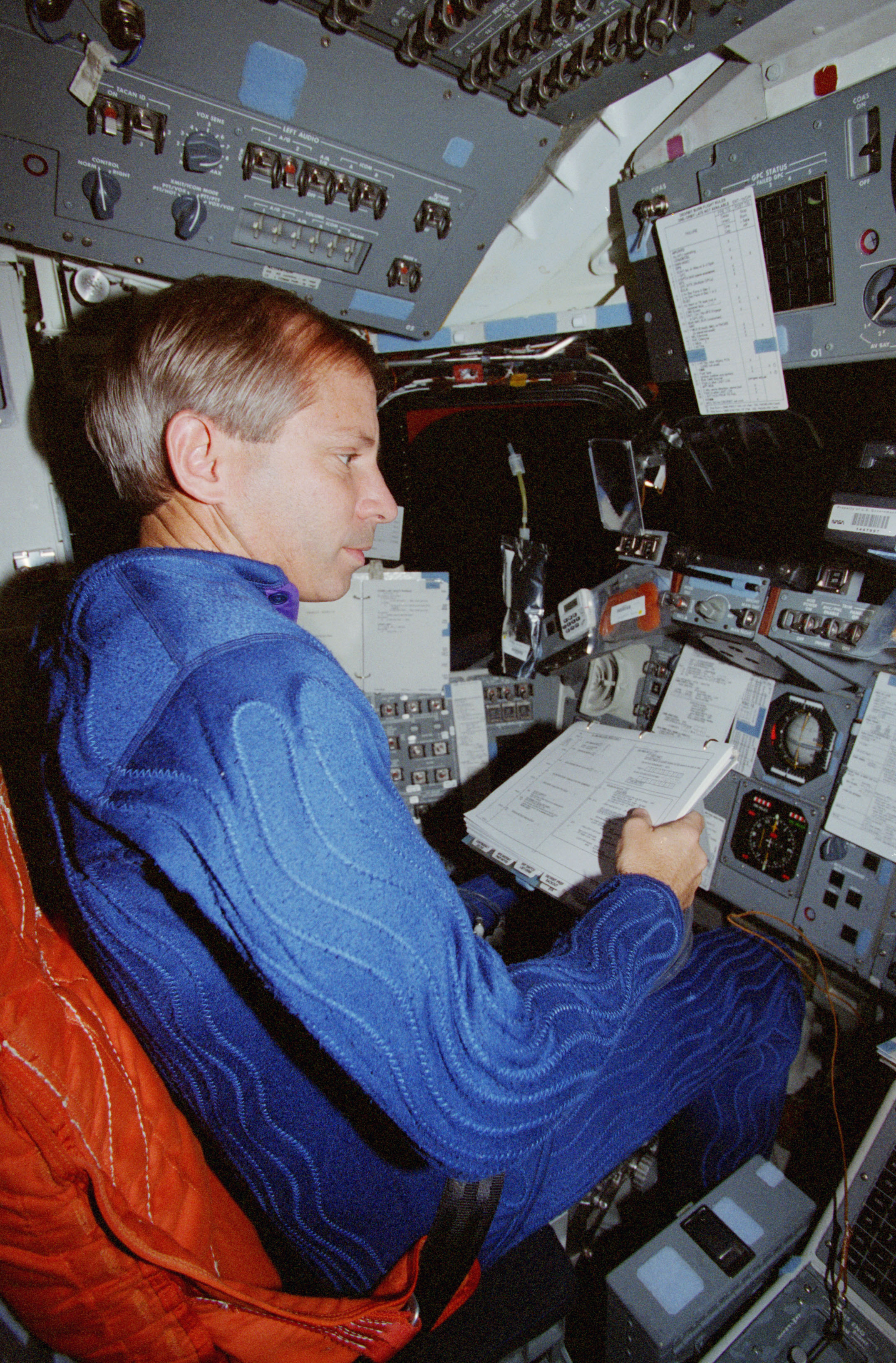Cockrell and Rominger go through de-orbit preparations in the flight deck