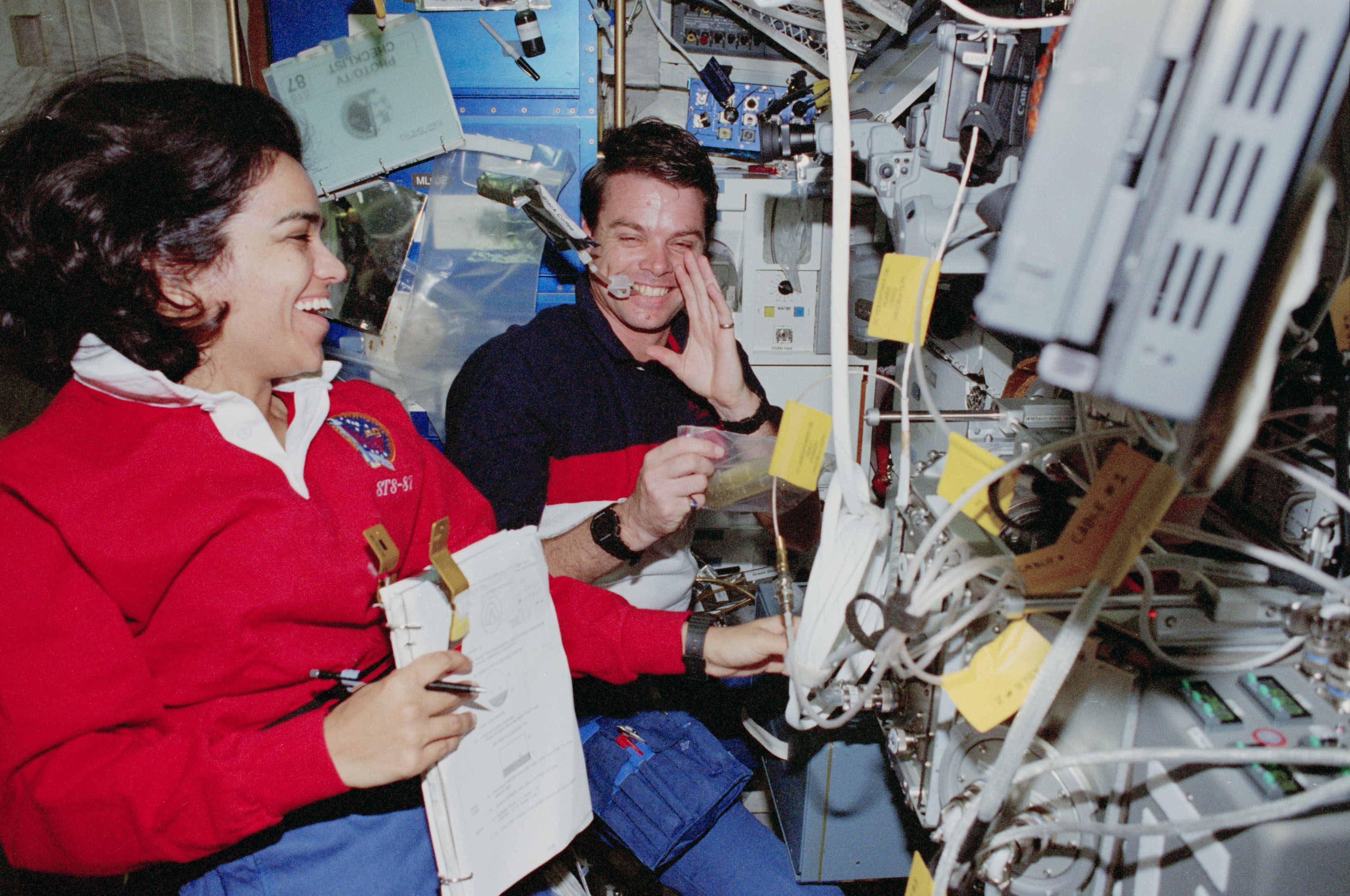 USMP-4 MGBX, Chawla and Kregel work with glovebox
